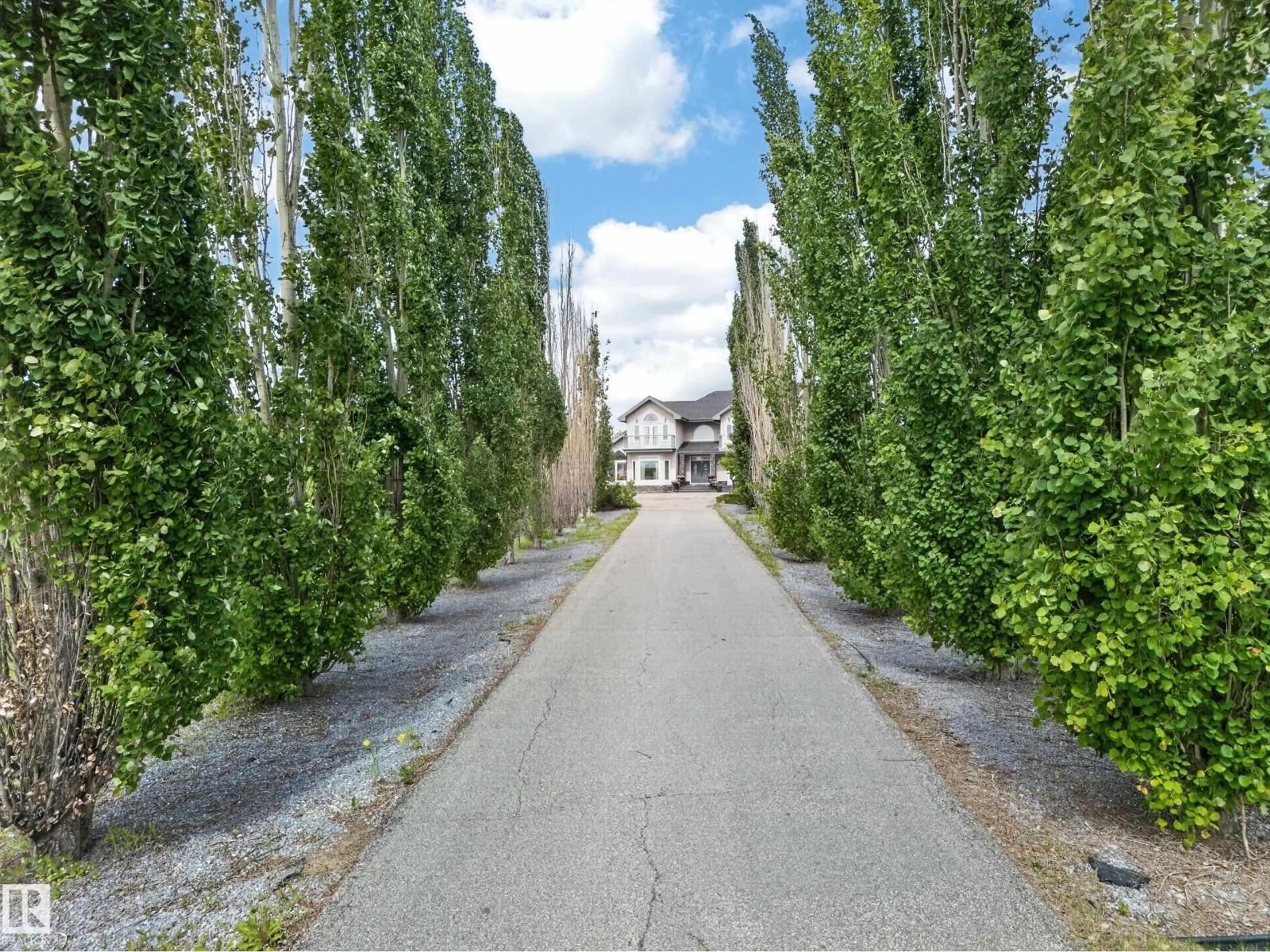A pic from outside/outdoor area/front of a property/back of a property/a pic from drone, street for 50 52216 RGE ROAD 233, Rural Strathcona County Alberta T8B1C9