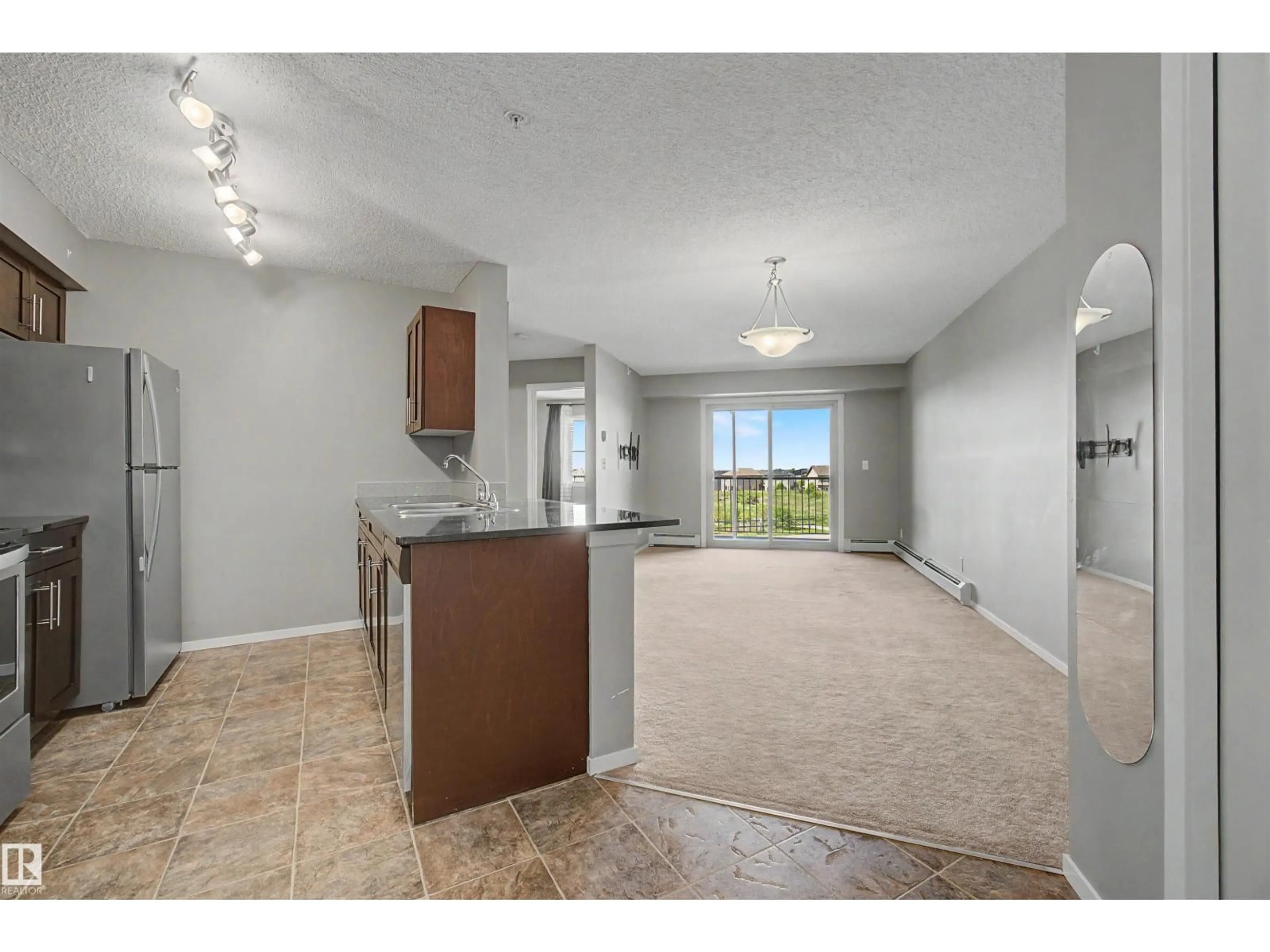 Open concept kitchen, unknown for #313 - 5370 CHAPPELLE RD, Edmonton Alberta T6W3L5