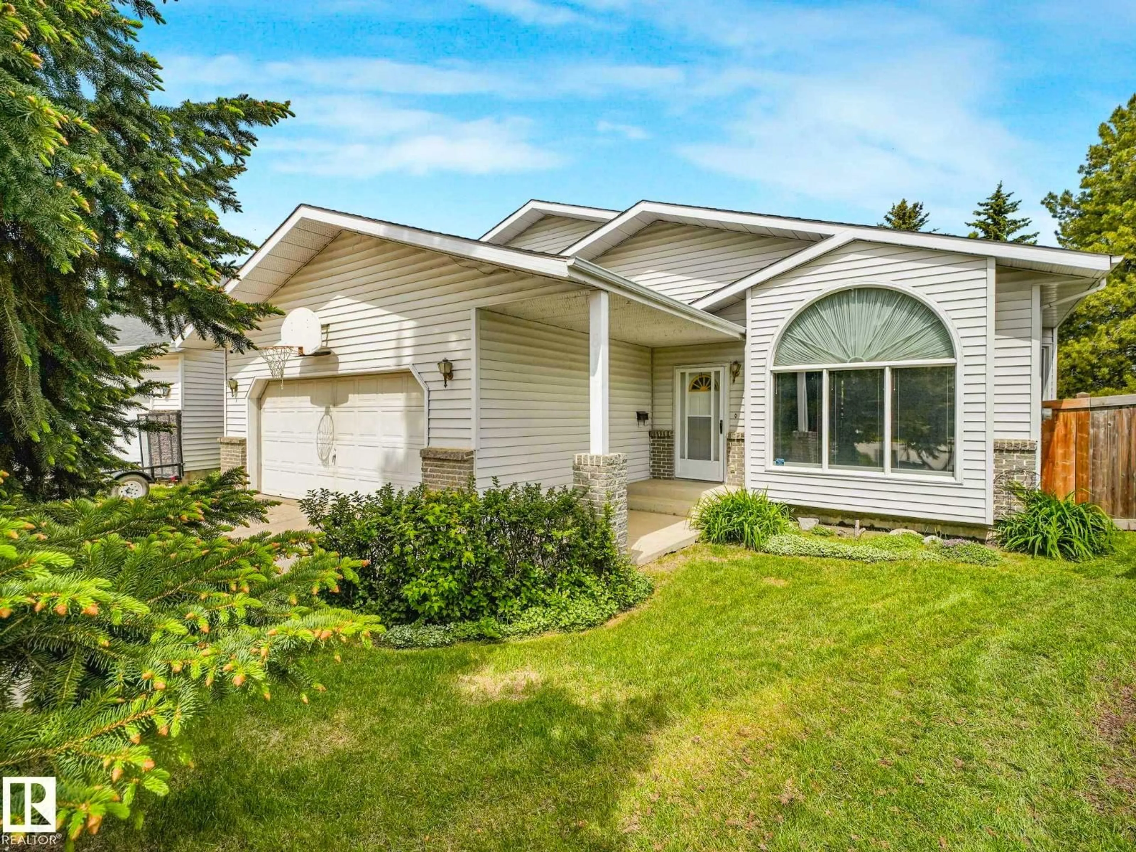 Home with vinyl exterior material, street for NW - 8121 188A ST, Edmonton Alberta T5T5A8