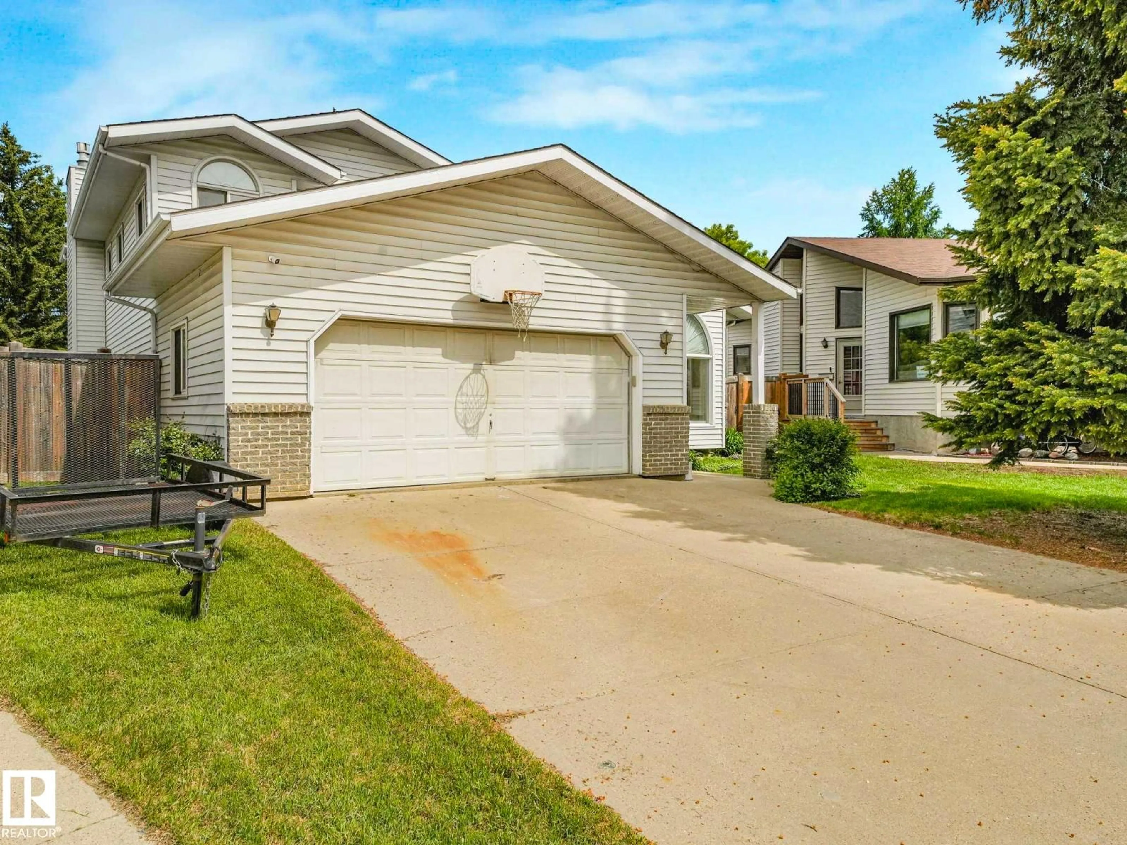 Home with vinyl exterior material, street for NW - 8121 188A ST, Edmonton Alberta T5T5A8