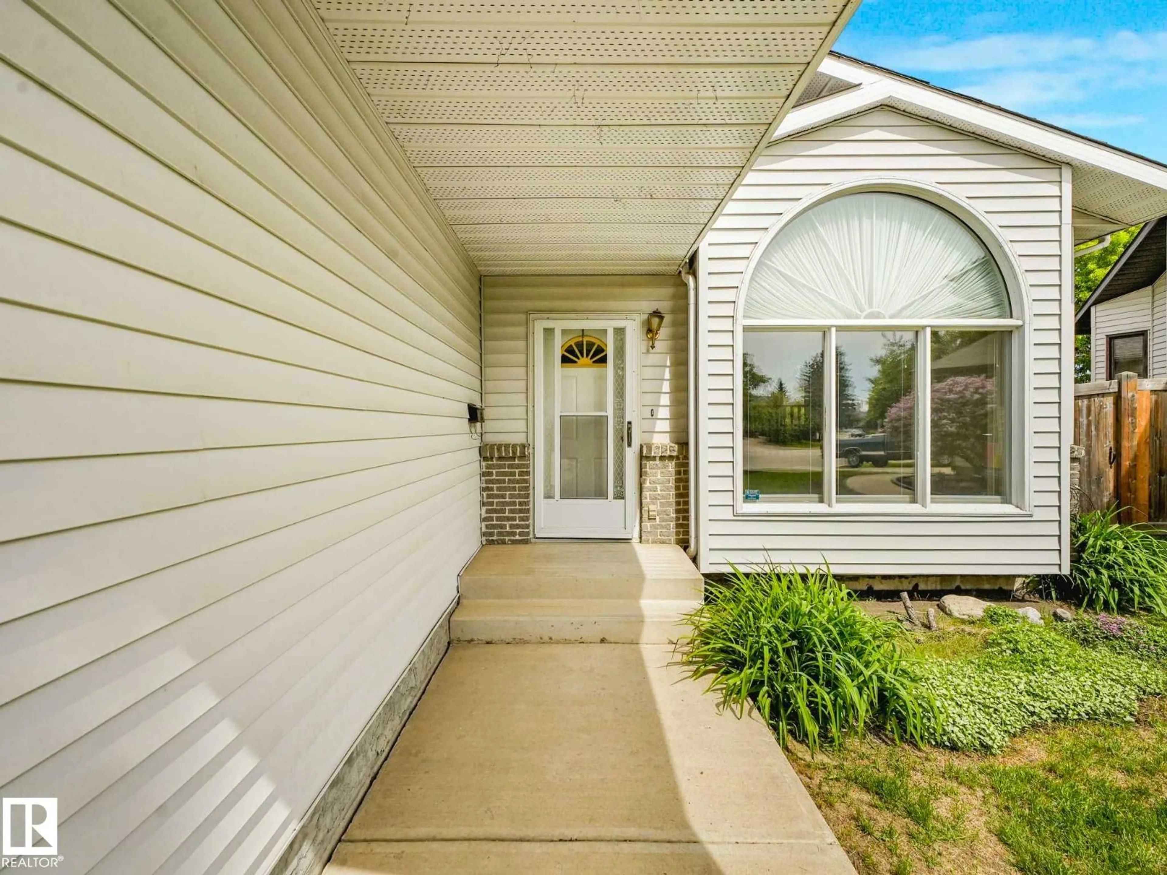 Home with vinyl exterior material, street for NW - 8121 188A ST, Edmonton Alberta T5T5A8