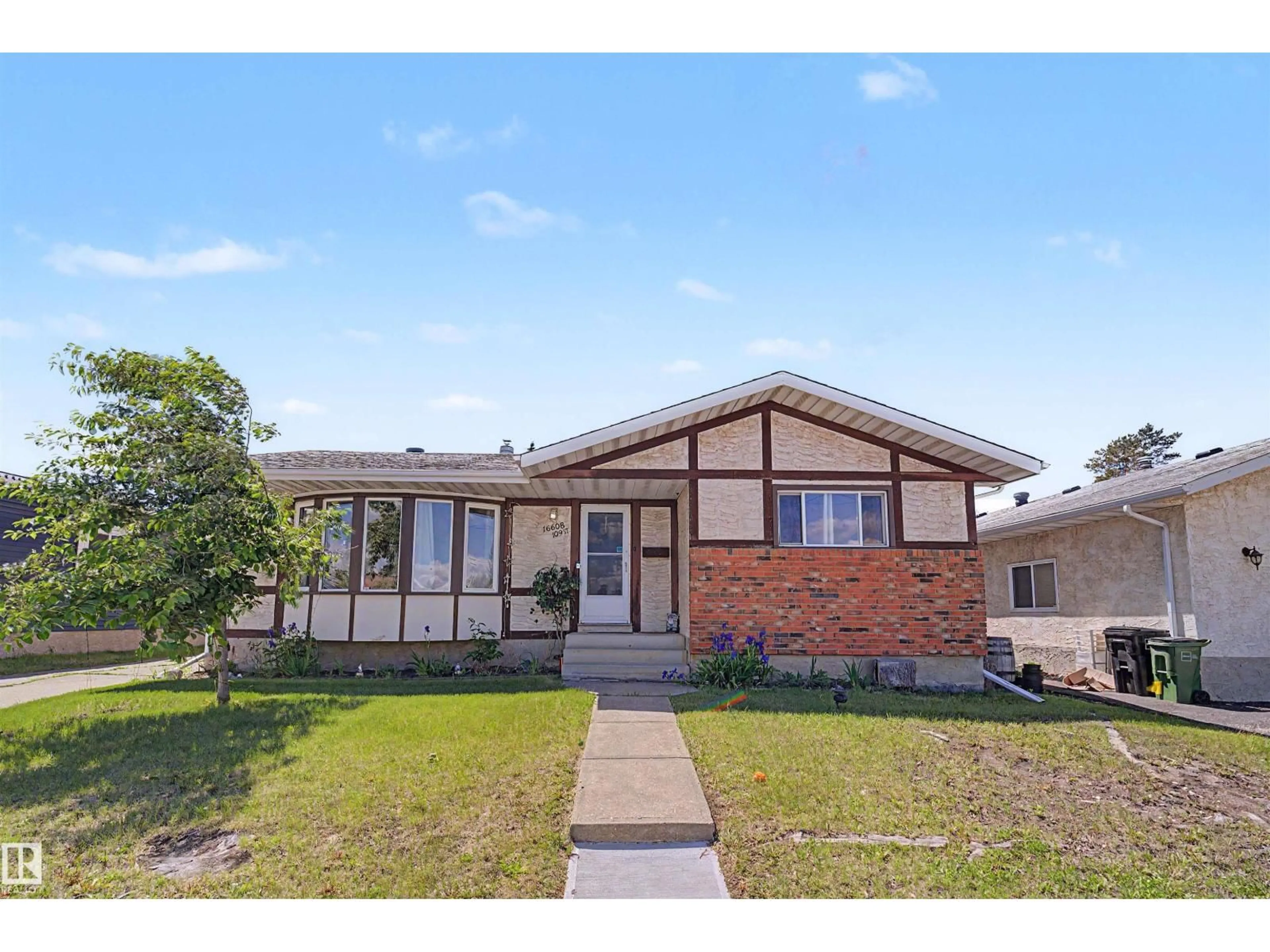 Home with brick exterior material, street for NW - 16608 109 ST, Edmonton Alberta T5X1W9