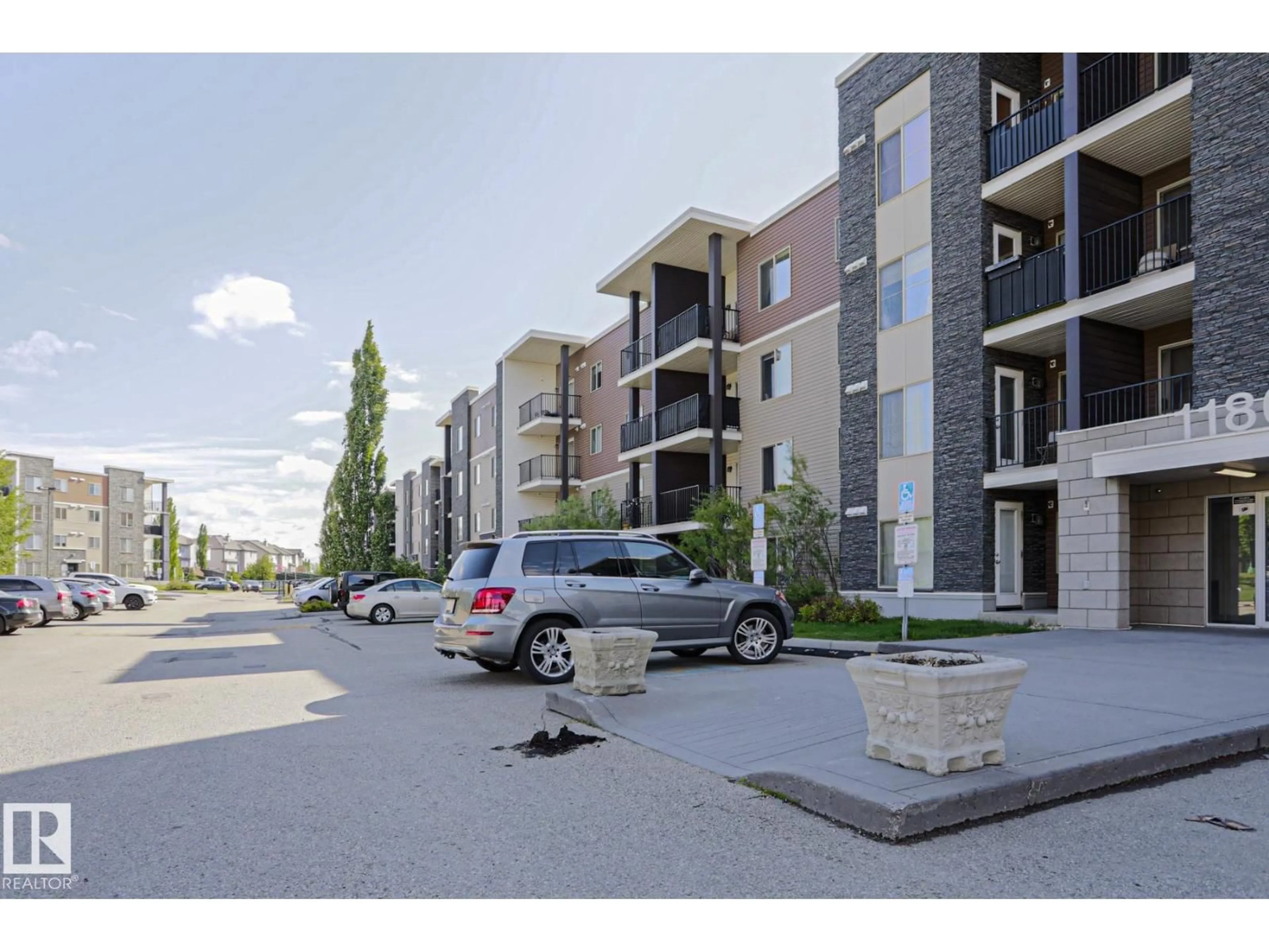 A pic from outside/outdoor area/front of a property/back of a property/a pic from drone, street for #405 - 11804 22 AV, Edmonton Alberta T6W2A2