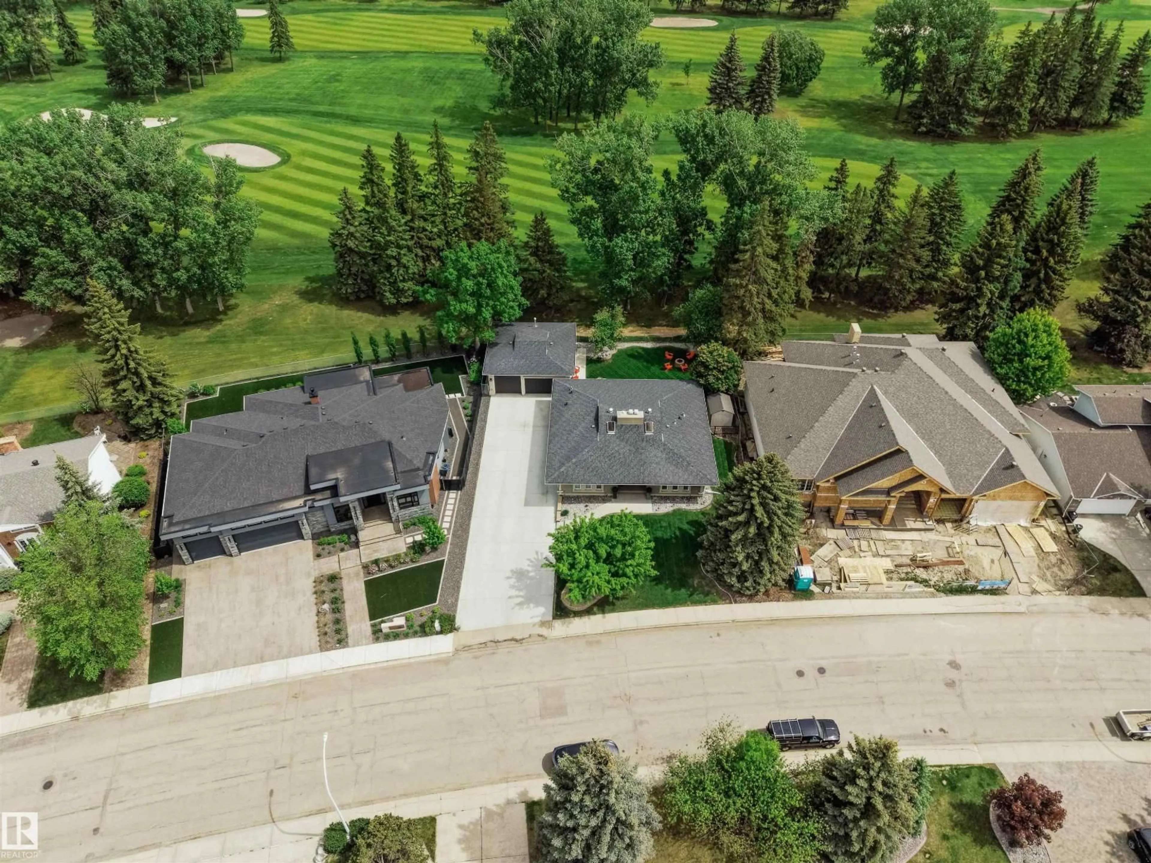 A pic from outside/outdoor area/front of a property/back of a property/a pic from drone, street for 111 FAIRWAY DR, Edmonton Alberta T6J2C2