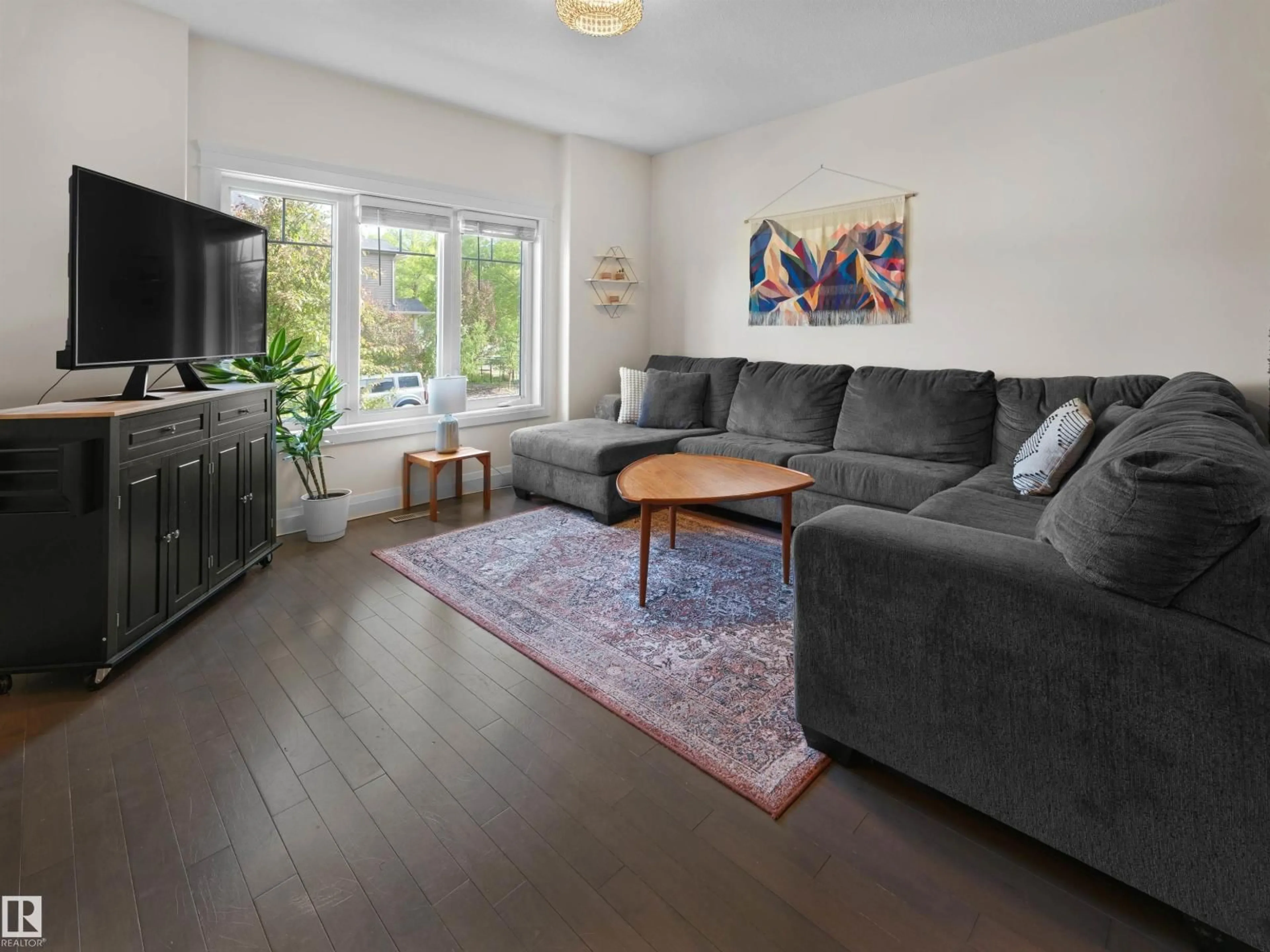 Living room with furniture, unknown for 10607 62 AV NW, Edmonton Alberta T6H1M7