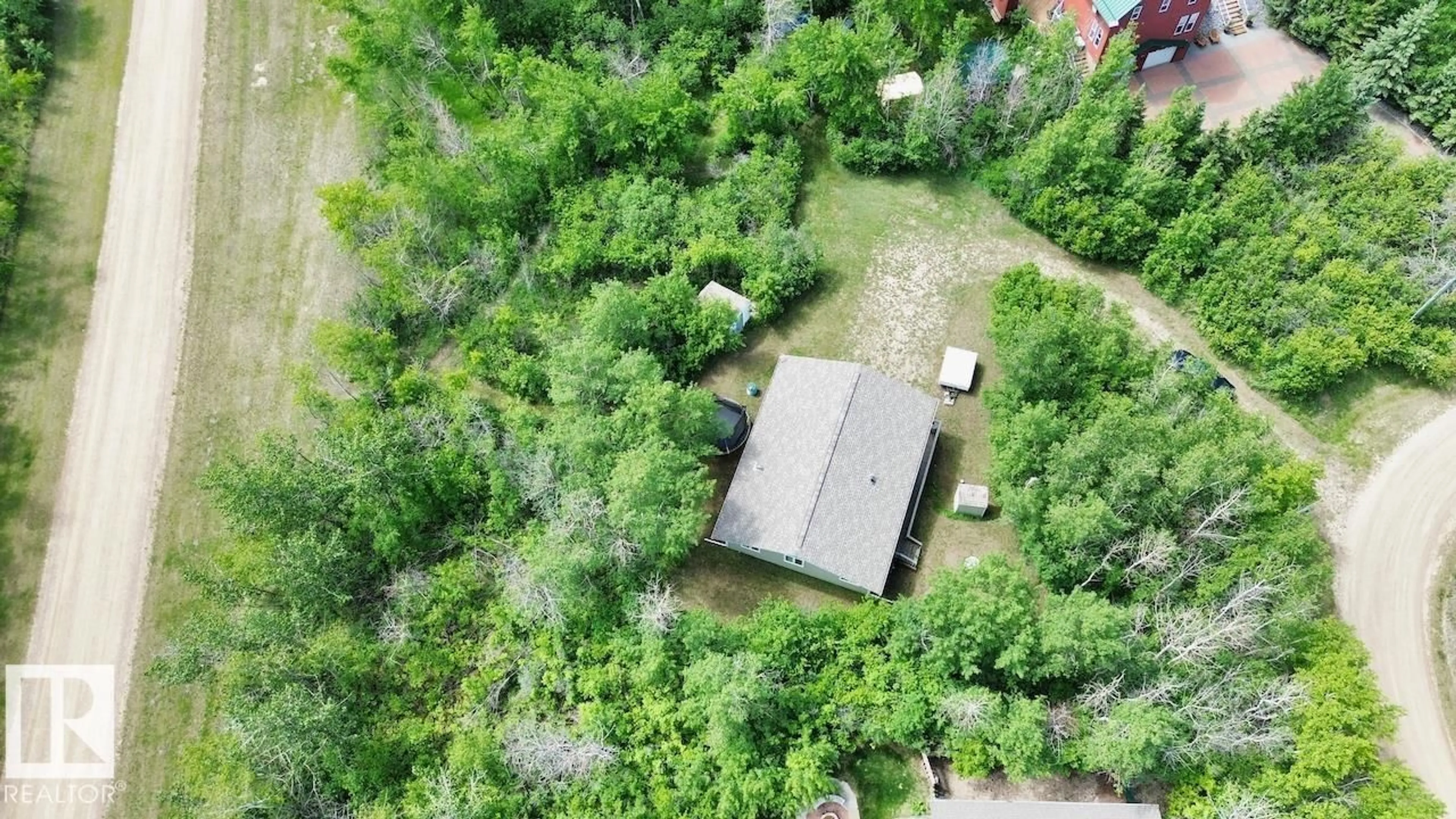 A pic from outside/outdoor area/front of a property/back of a property/a pic from drone, forest/trees view for 4 KAYLEE CRESCENT, Rural Stettler County Alberta T0C3B0