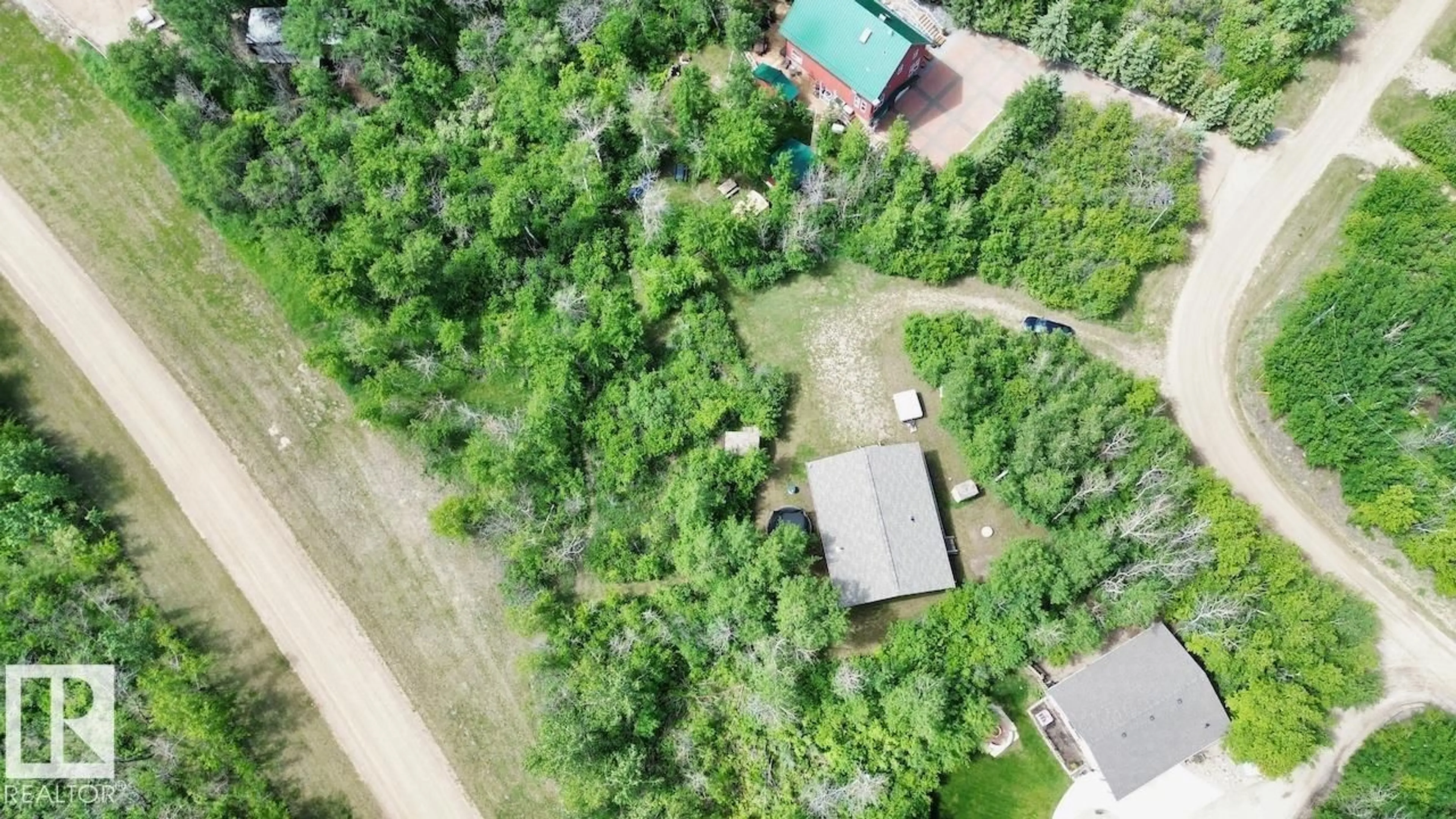 A pic from outside/outdoor area/front of a property/back of a property/a pic from drone, forest/trees view for 4 KAYLEE CRESCENT, Rural Stettler County Alberta T0C3B0