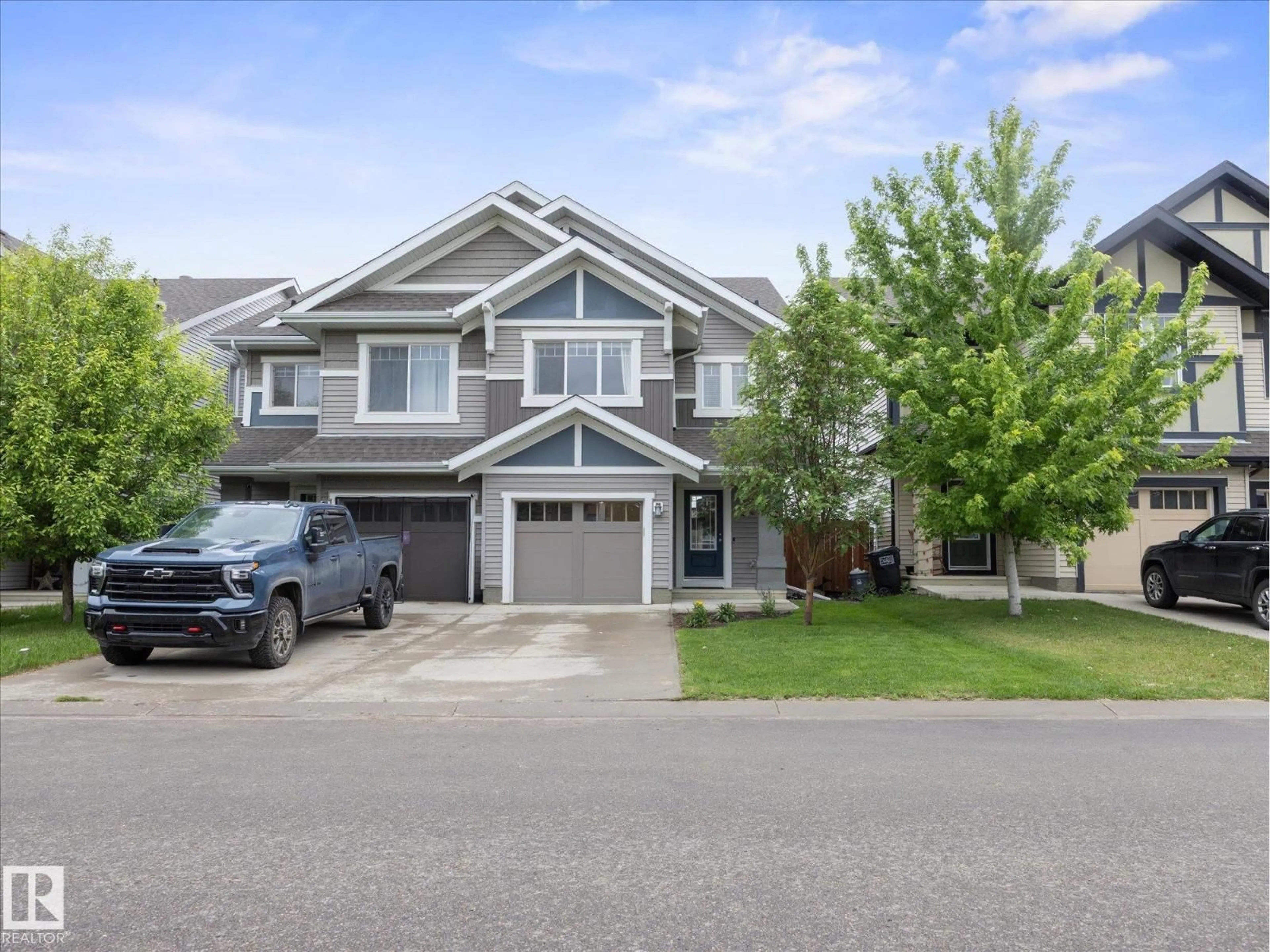 Home with vinyl exterior material, street for 2762 COUGHLAN GREEN GR, Edmonton Alberta T6W3N9