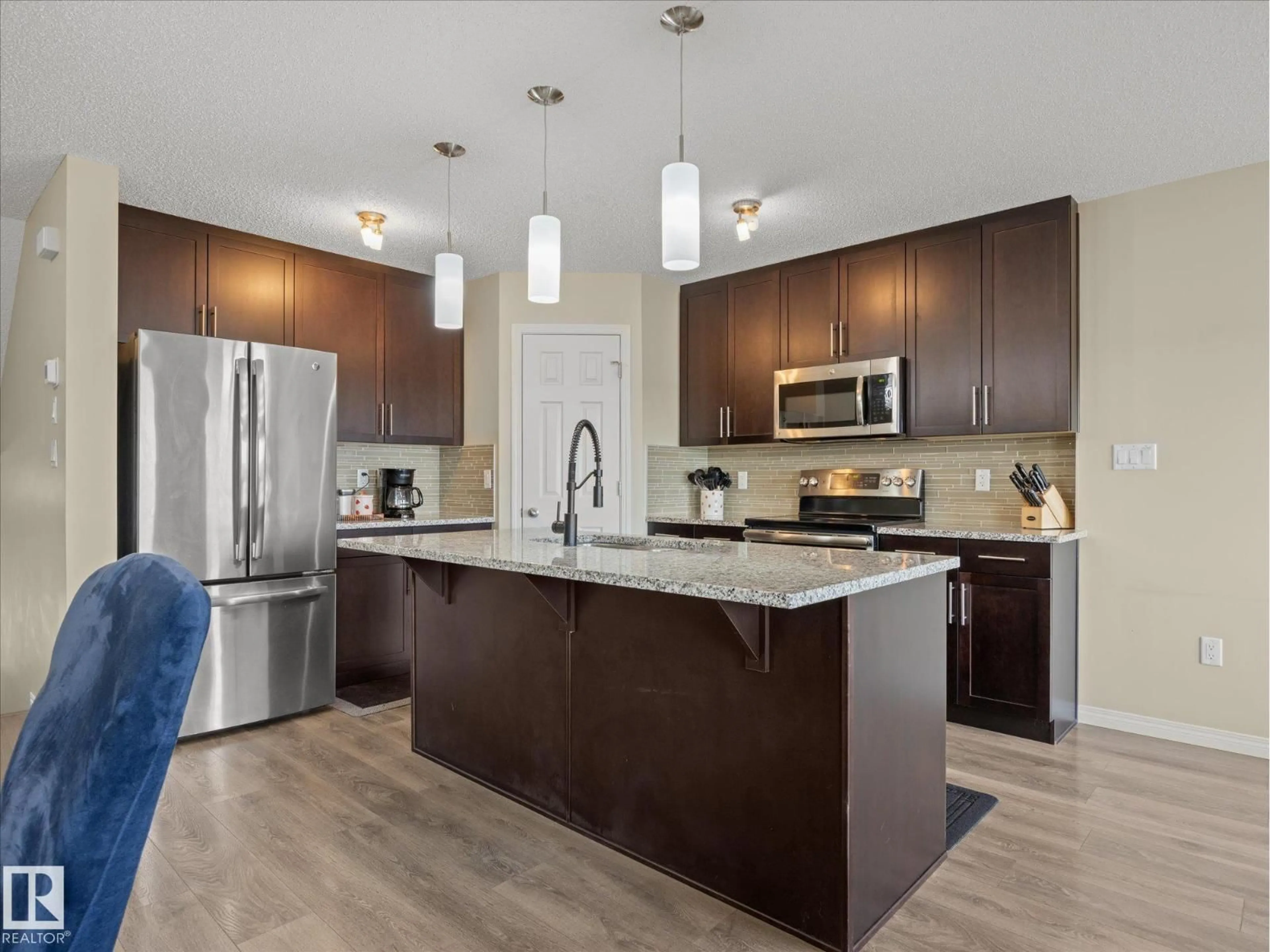 Open concept kitchen, unknown for 2762 COUGHLAN GREEN GR, Edmonton Alberta T6W3N9
