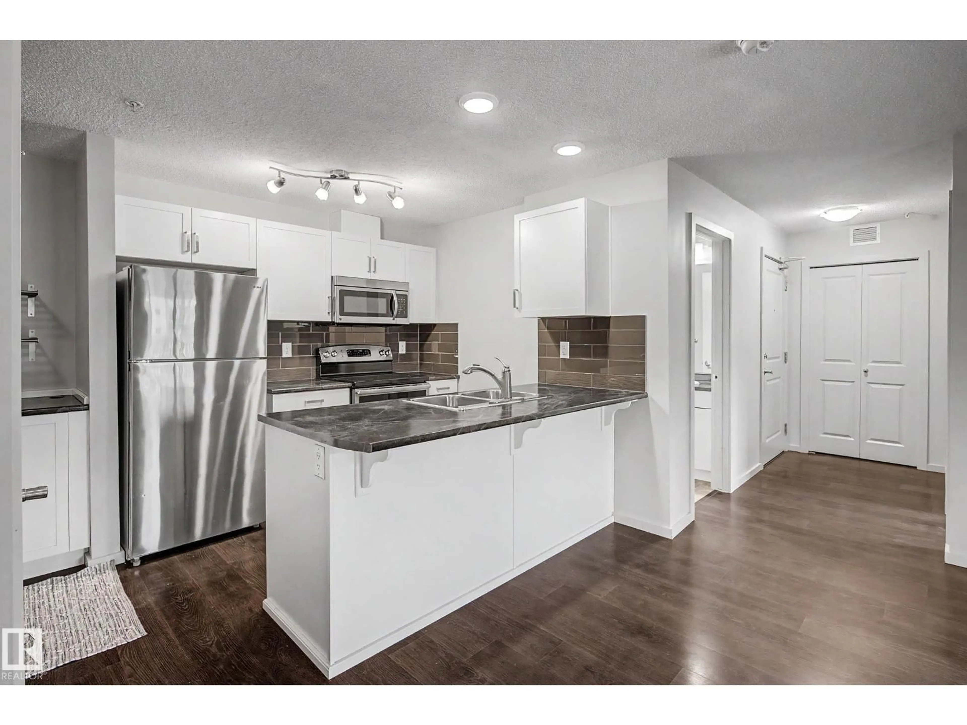 Open concept kitchen, unknown for #327 - 5515 7 AV SW, Edmonton Alberta T6X2A8