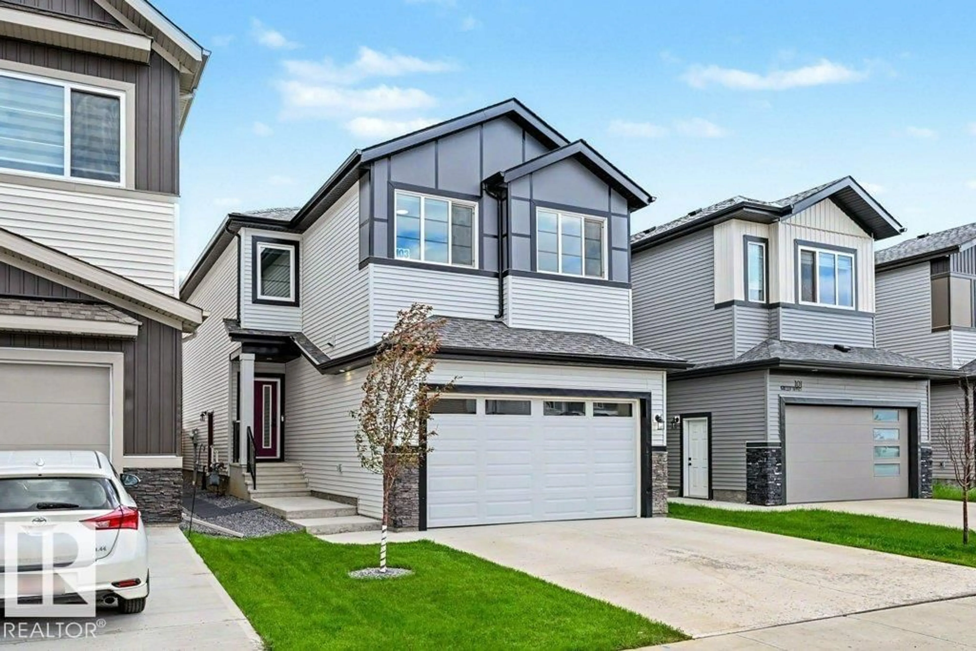 Home with vinyl exterior material, street for 103 MILLER WD, Leduc Alberta T9E1R7