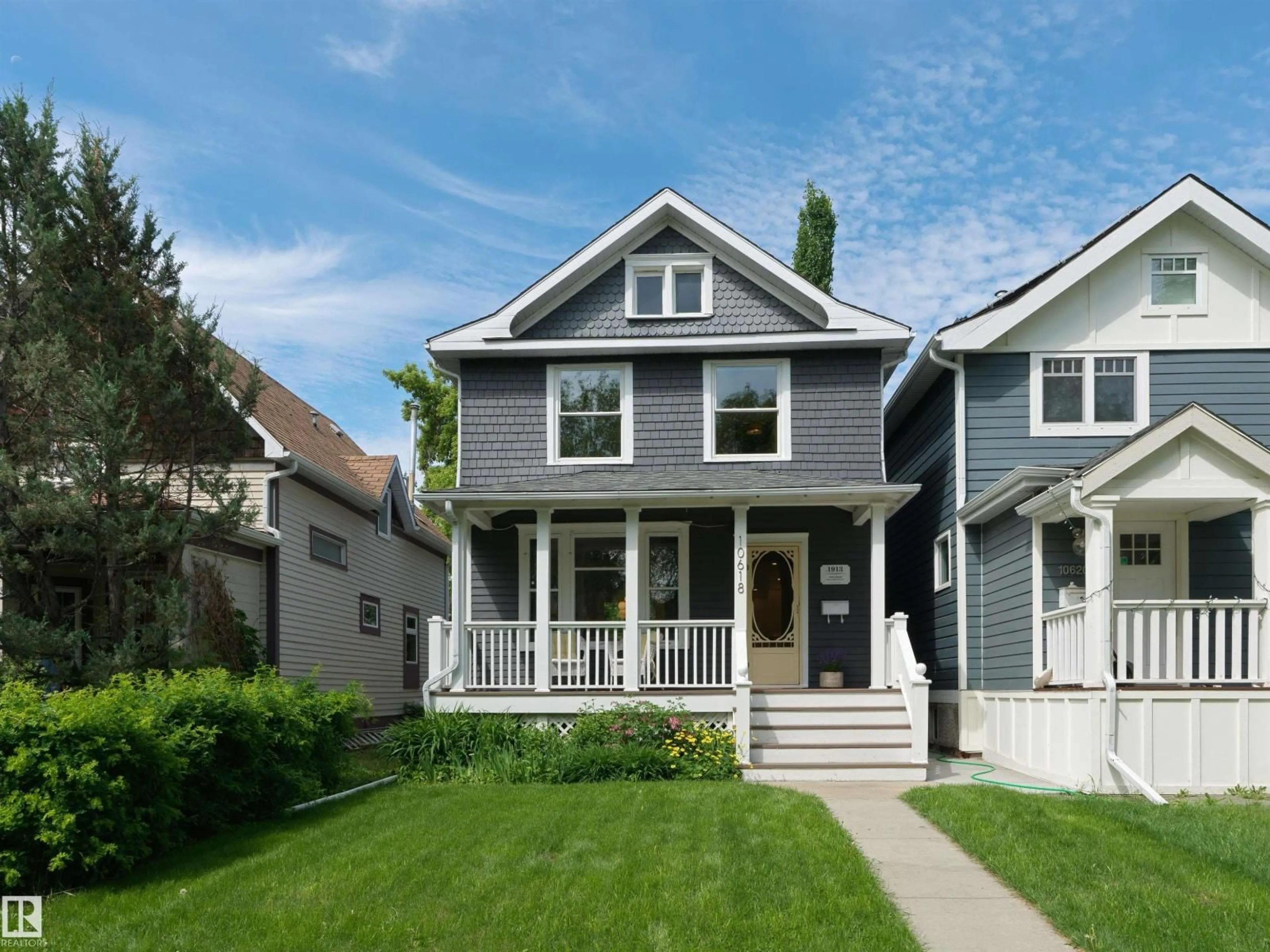 Home with vinyl exterior material, street for NW - 10618 126 ST, Edmonton Alberta T5N1V4