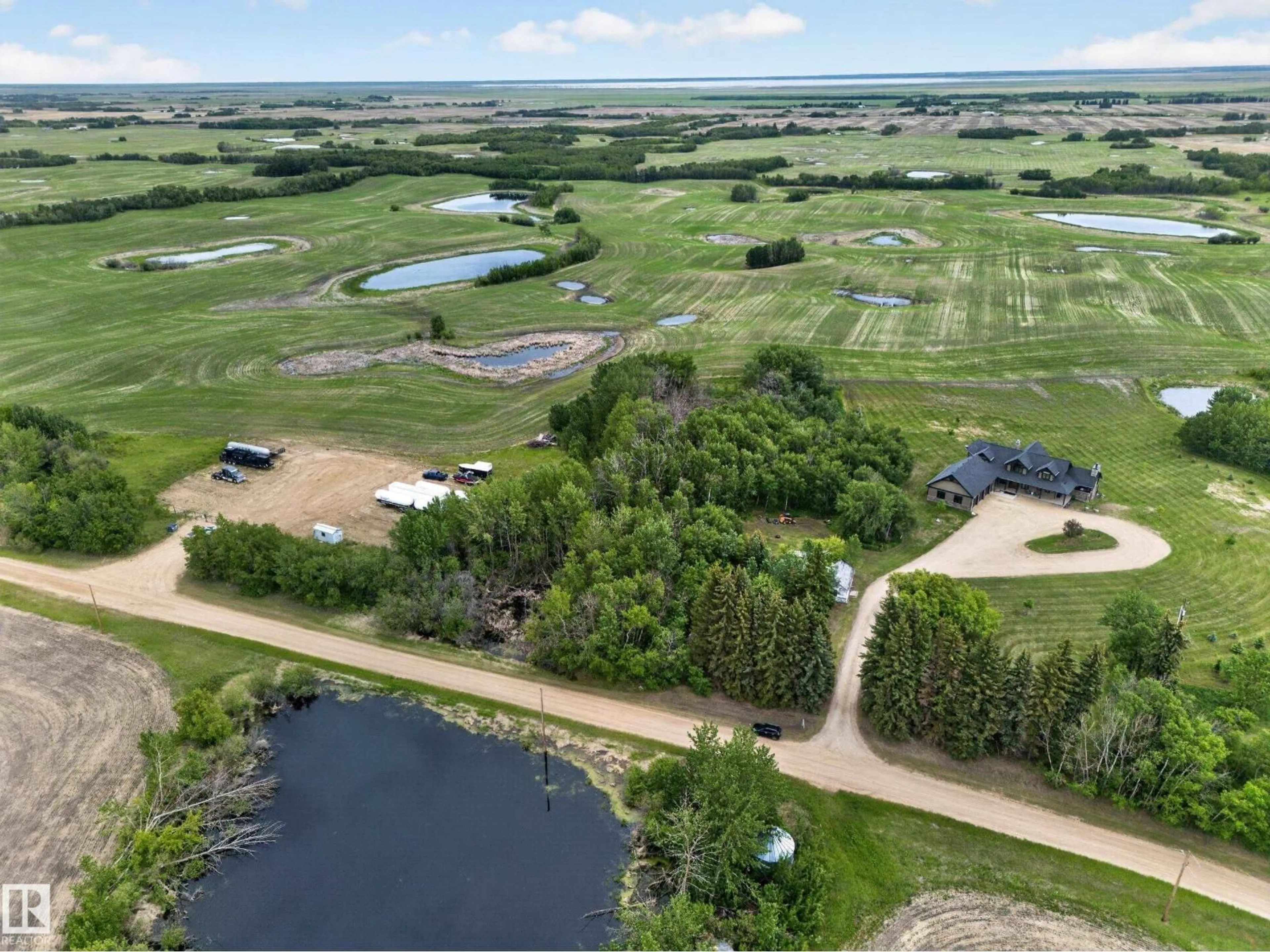 A pic from outside/outdoor area/front of a property/back of a property/a pic from drone, water/lake/river/ocean view for 51305 RANGE ROAD 192, Rural Beaver County Alberta T4J4J5