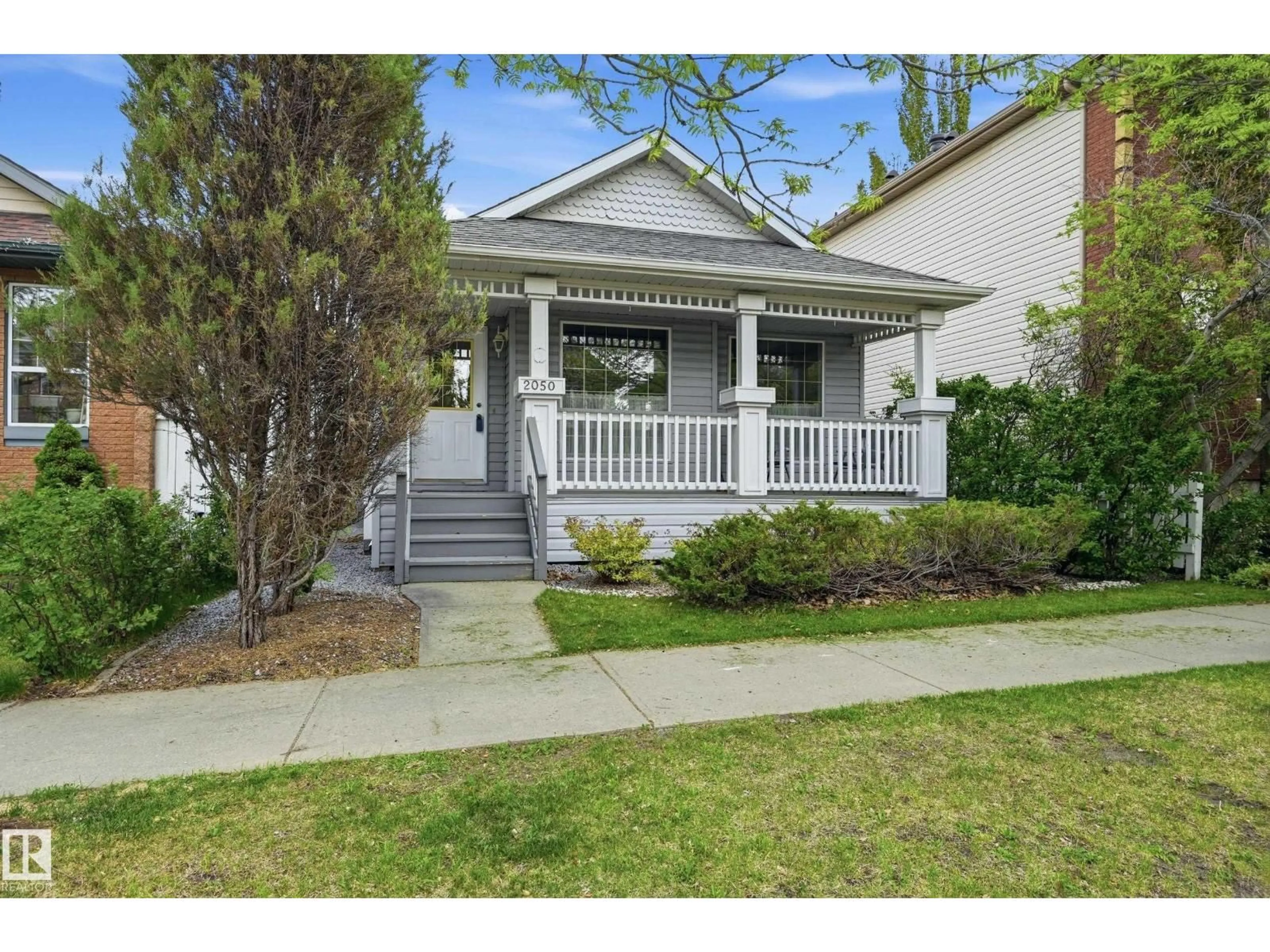 Home with vinyl exterior material, street for 2050 TANNER WD, Edmonton Alberta T6R2R4