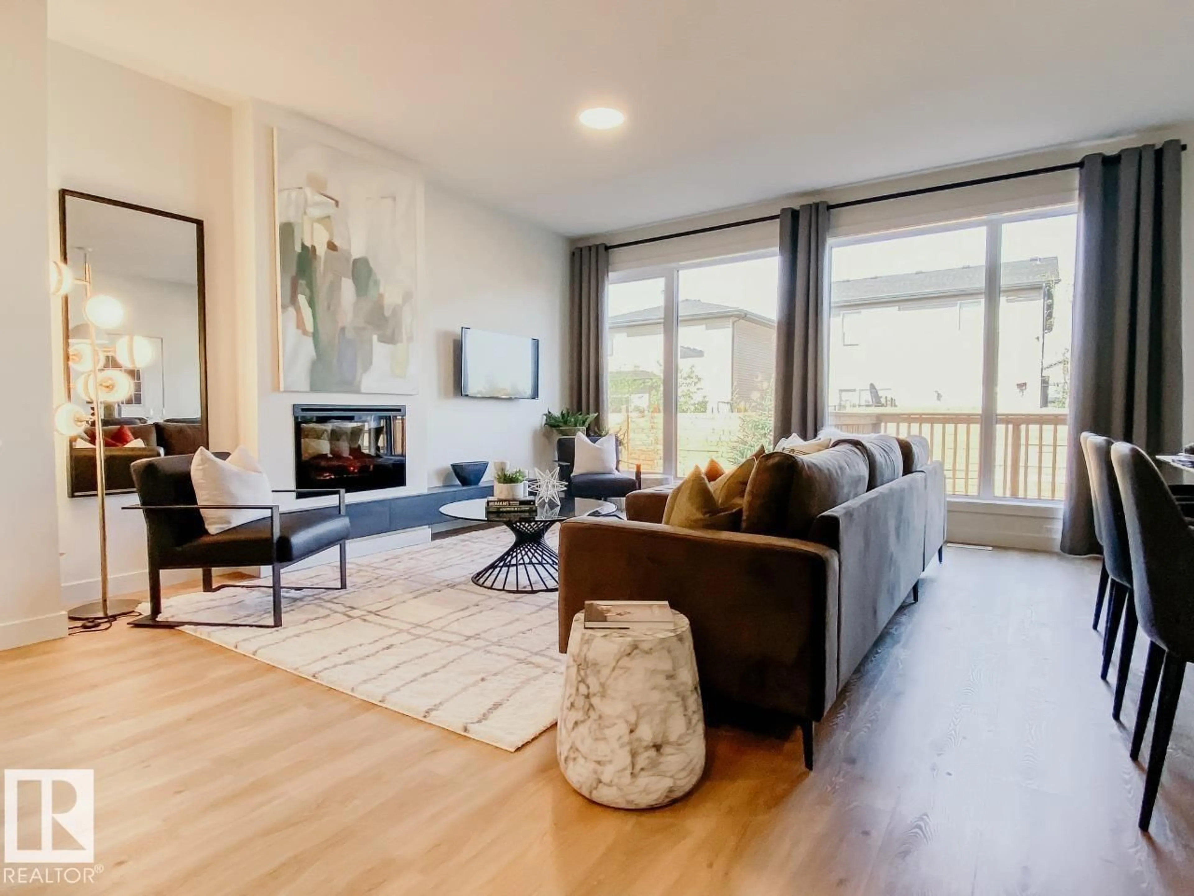 Living room with furniture, wood/laminate floor for SW - 304 33 ST, Edmonton Alberta T6X1A7