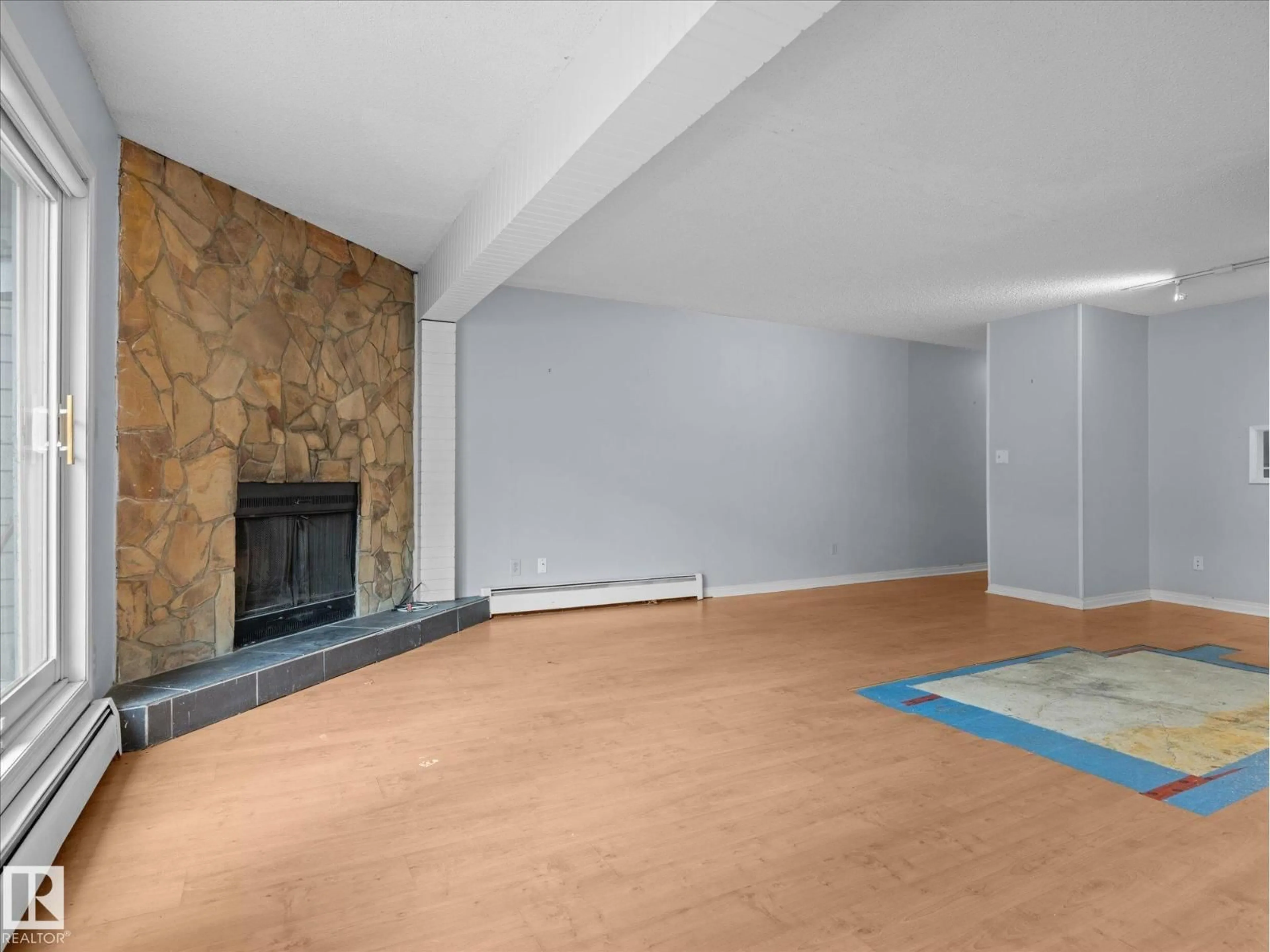 A pic of a room for #110 - 10139 117 ST, Edmonton Alberta T5K2L3