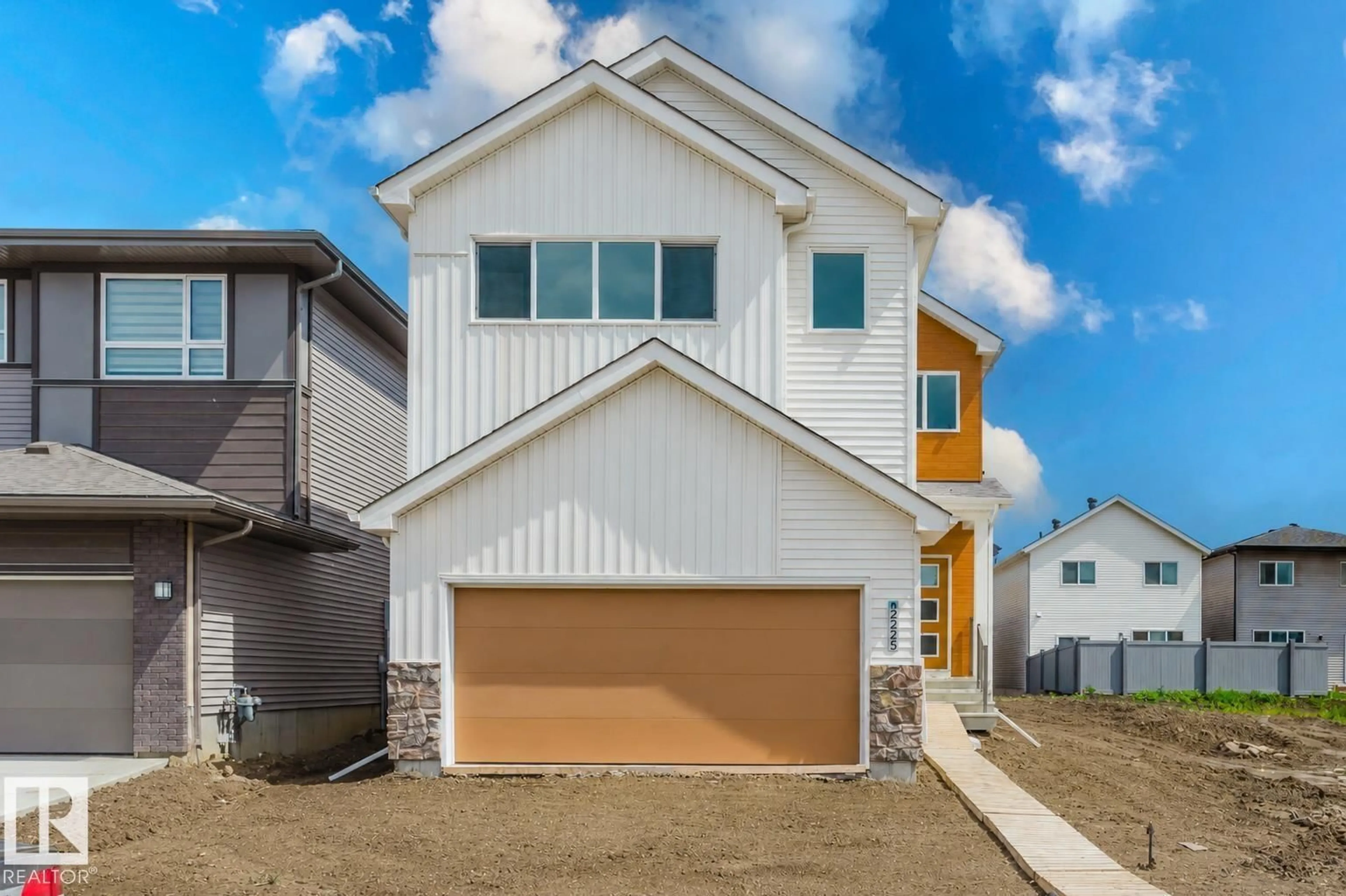 Home with vinyl exterior material, street for NW - 2225 194A ST, Edmonton Alberta T6M3J2