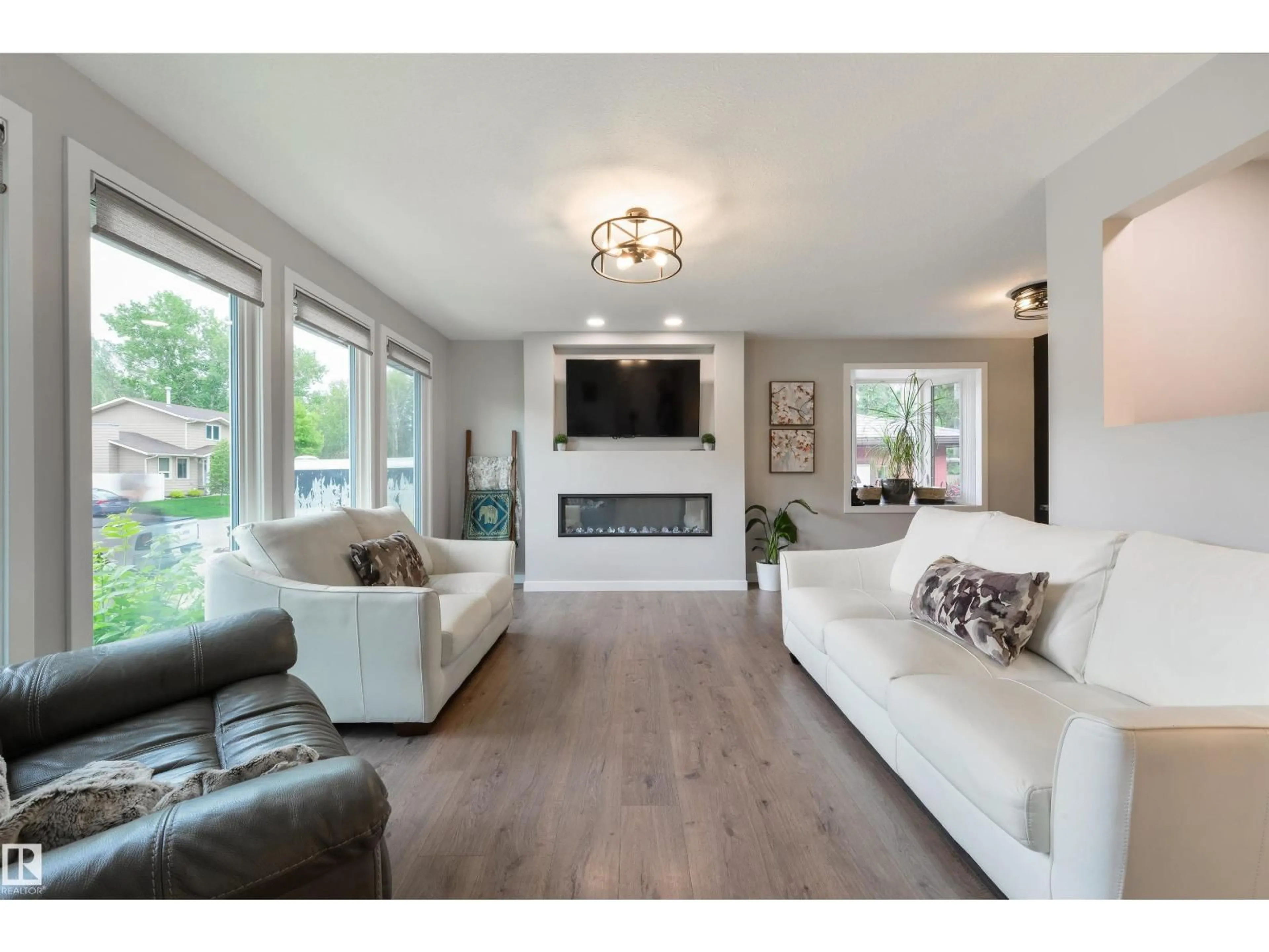 Living room with furniture, wood/laminate floor for 3 MORRIS ST, Spruce Grove Alberta T7X2M5