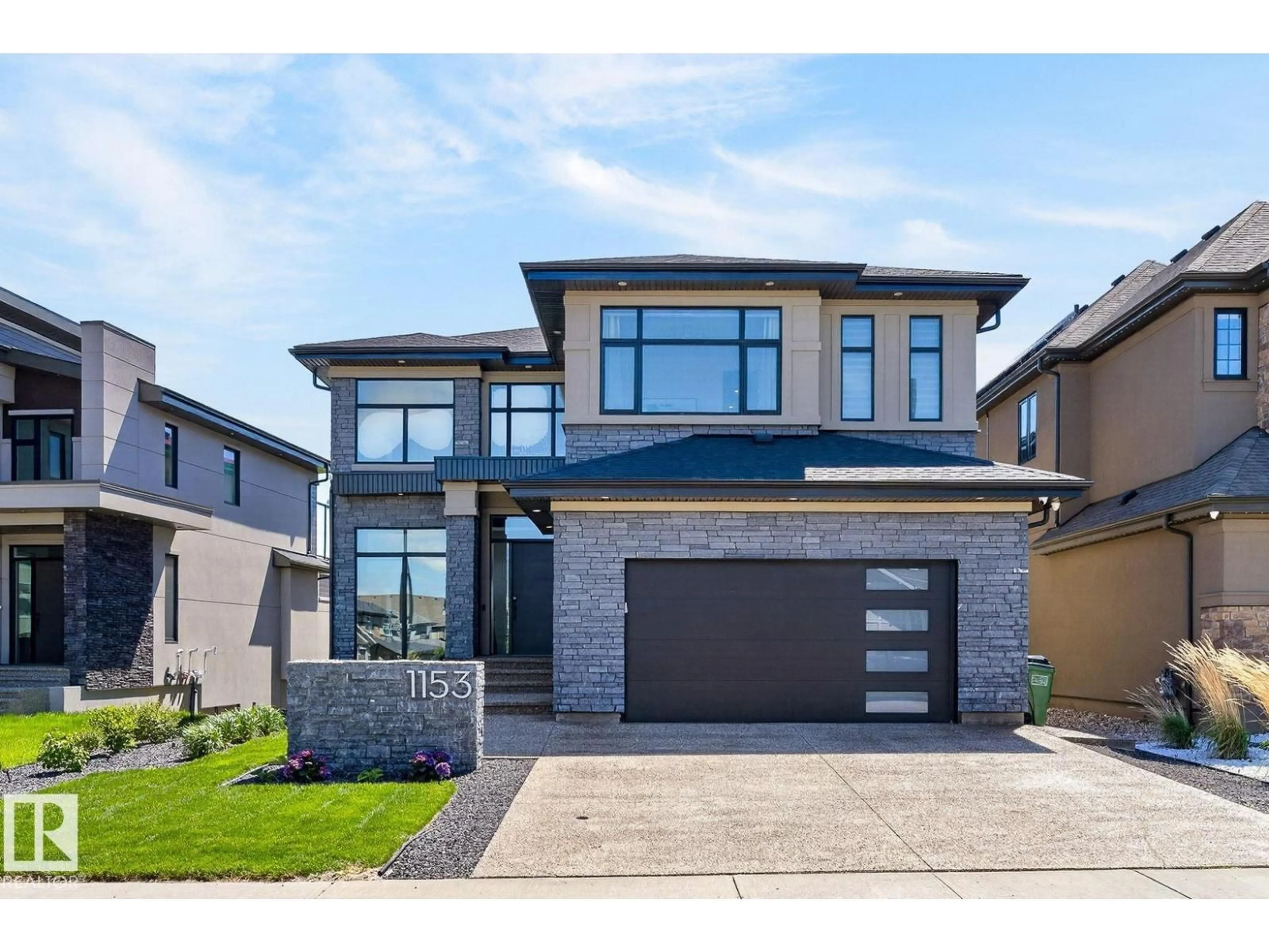 Home with brick exterior material, street for GR SW - 1153 HAINSTOCK GREEN, Edmonton Alberta T6W3B6