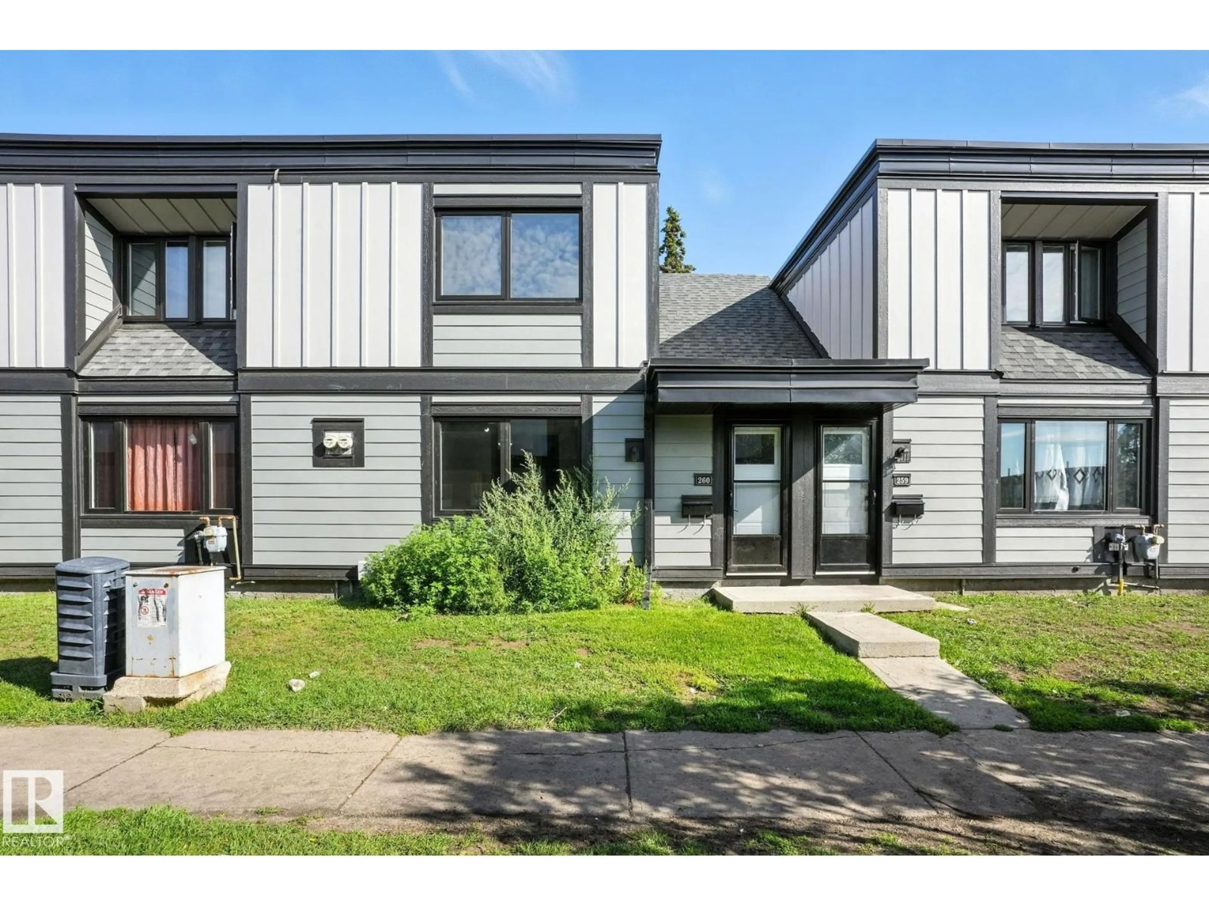 Home with vinyl exterior material, street for 260 - 3307 116A AV NW, Edmonton Alberta T5W5J9