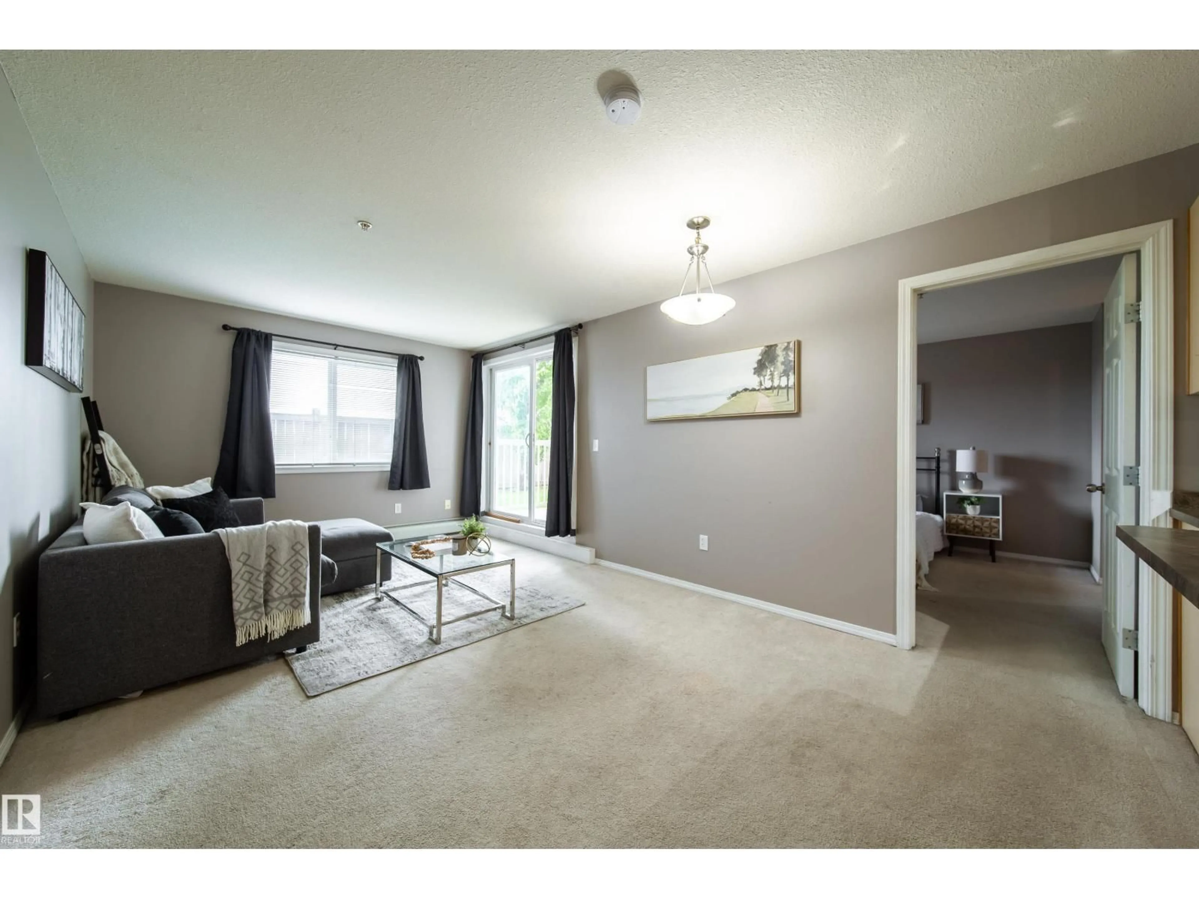 Living room with furniture, unknown for #115 - 4309 33 ST, Stony Plain Alberta T7Z0C4