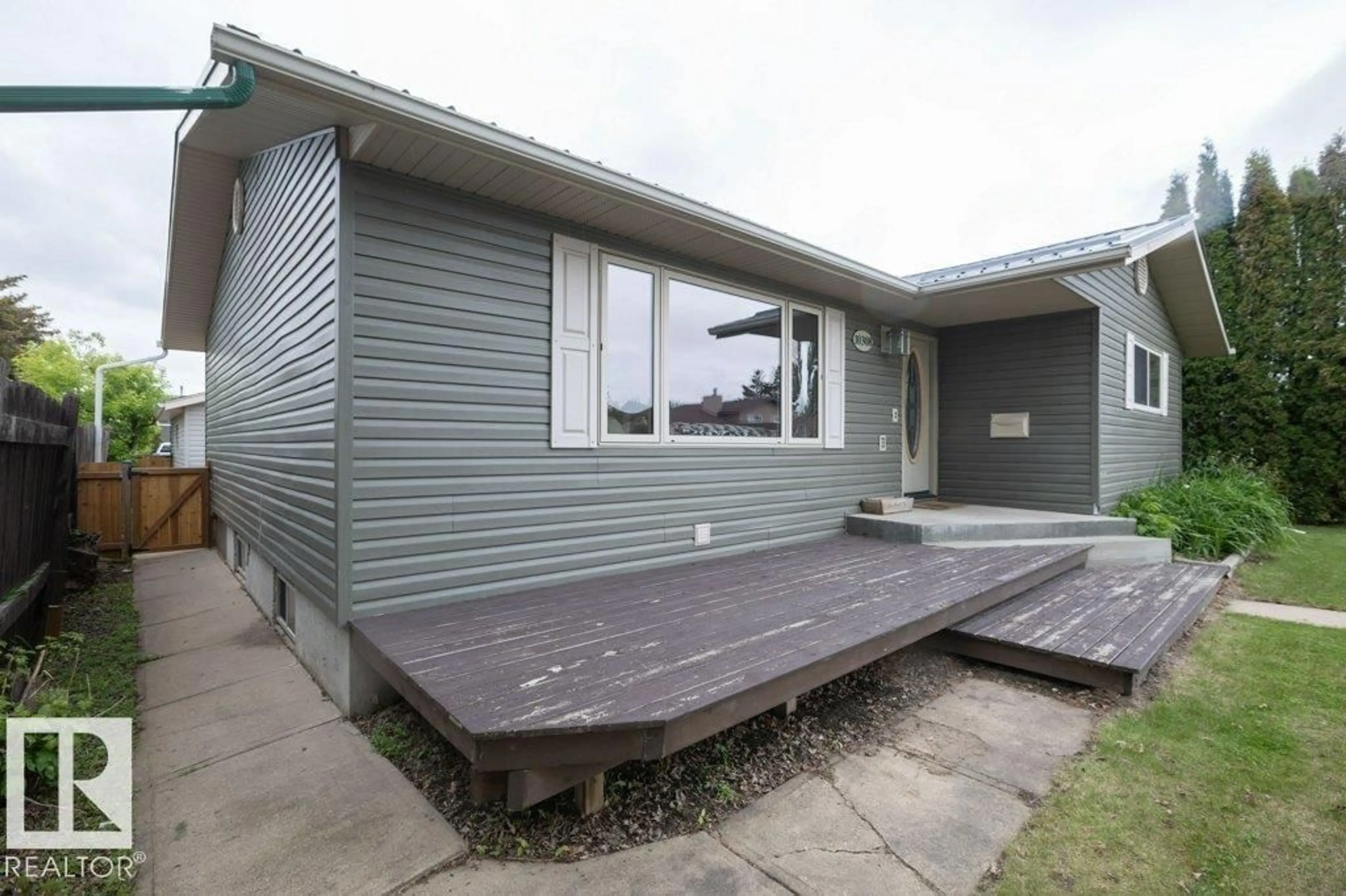 Home with vinyl exterior material, street for 10308 110 AV, Westlock Alberta T7P1G2