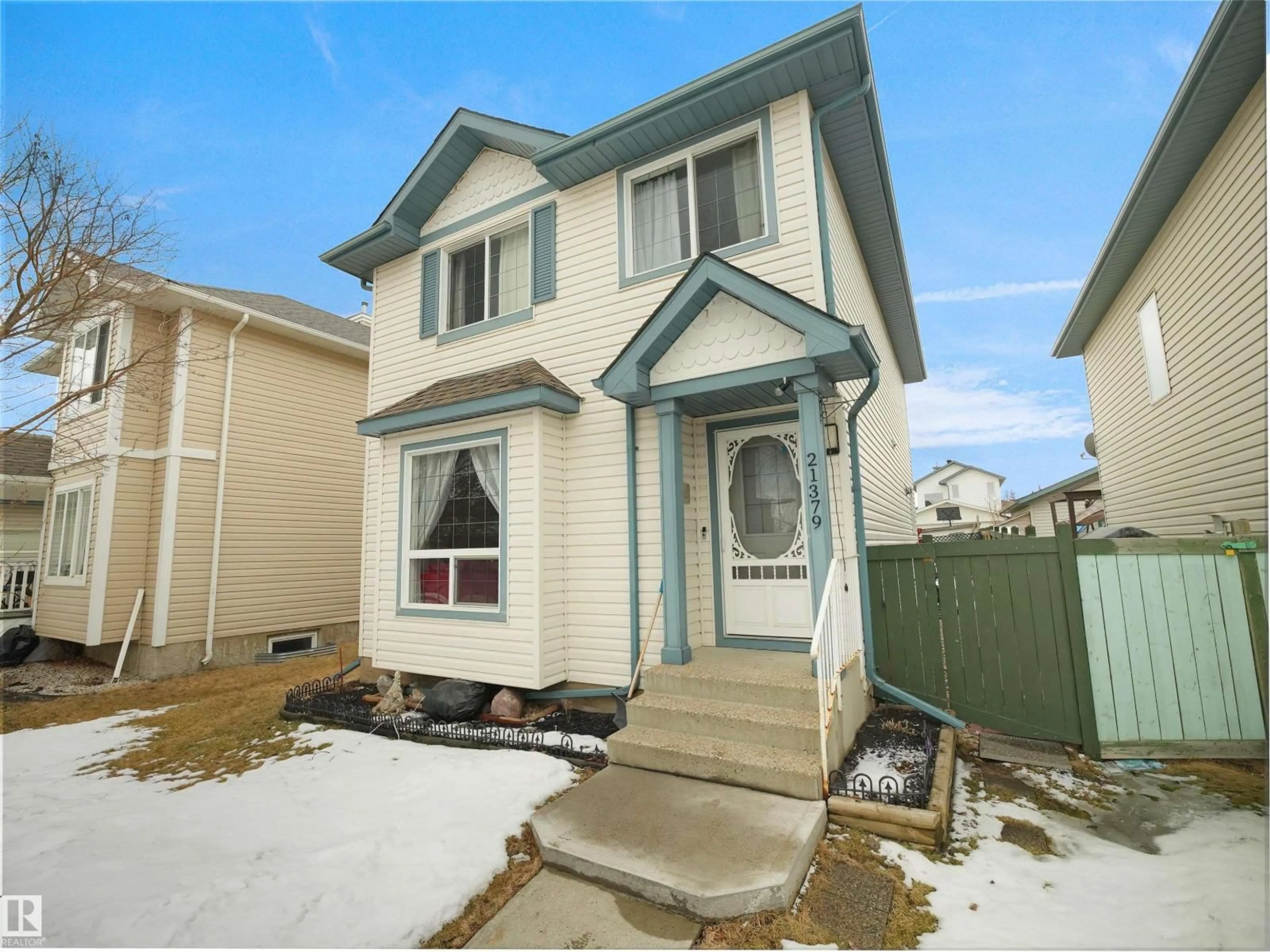 Home with vinyl exterior material, street for NW - 21379 89 AV, Edmonton Alberta T5T6V3