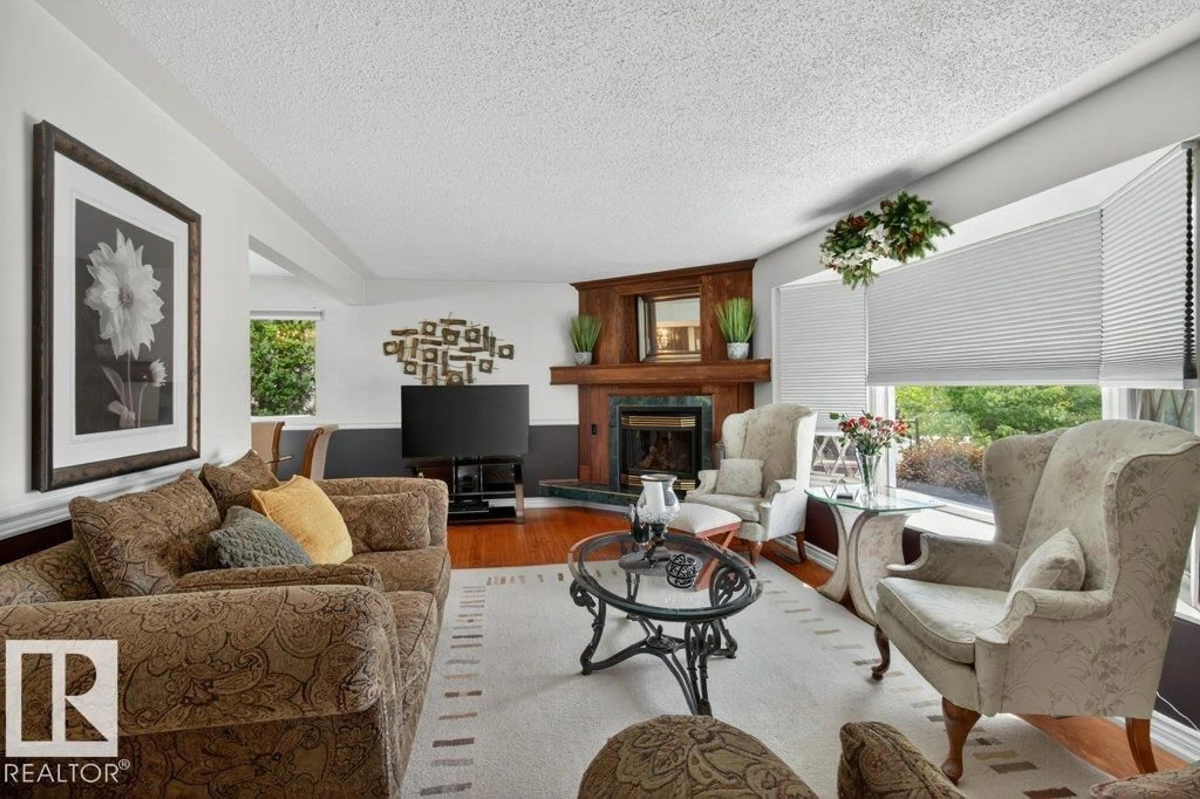 Living room with furniture, unknown for 6616 95 AV, Edmonton Alberta T6B1A7