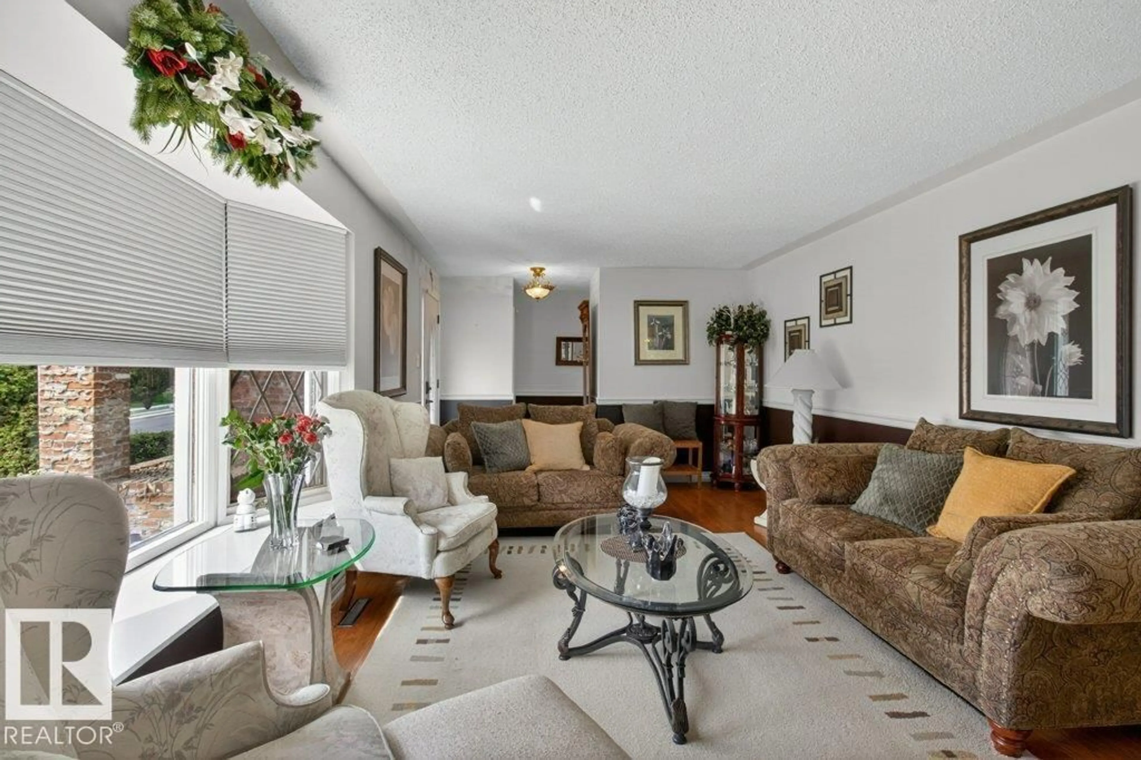 Living room with furniture, unknown for 6616 95 AV, Edmonton Alberta T6B1A7