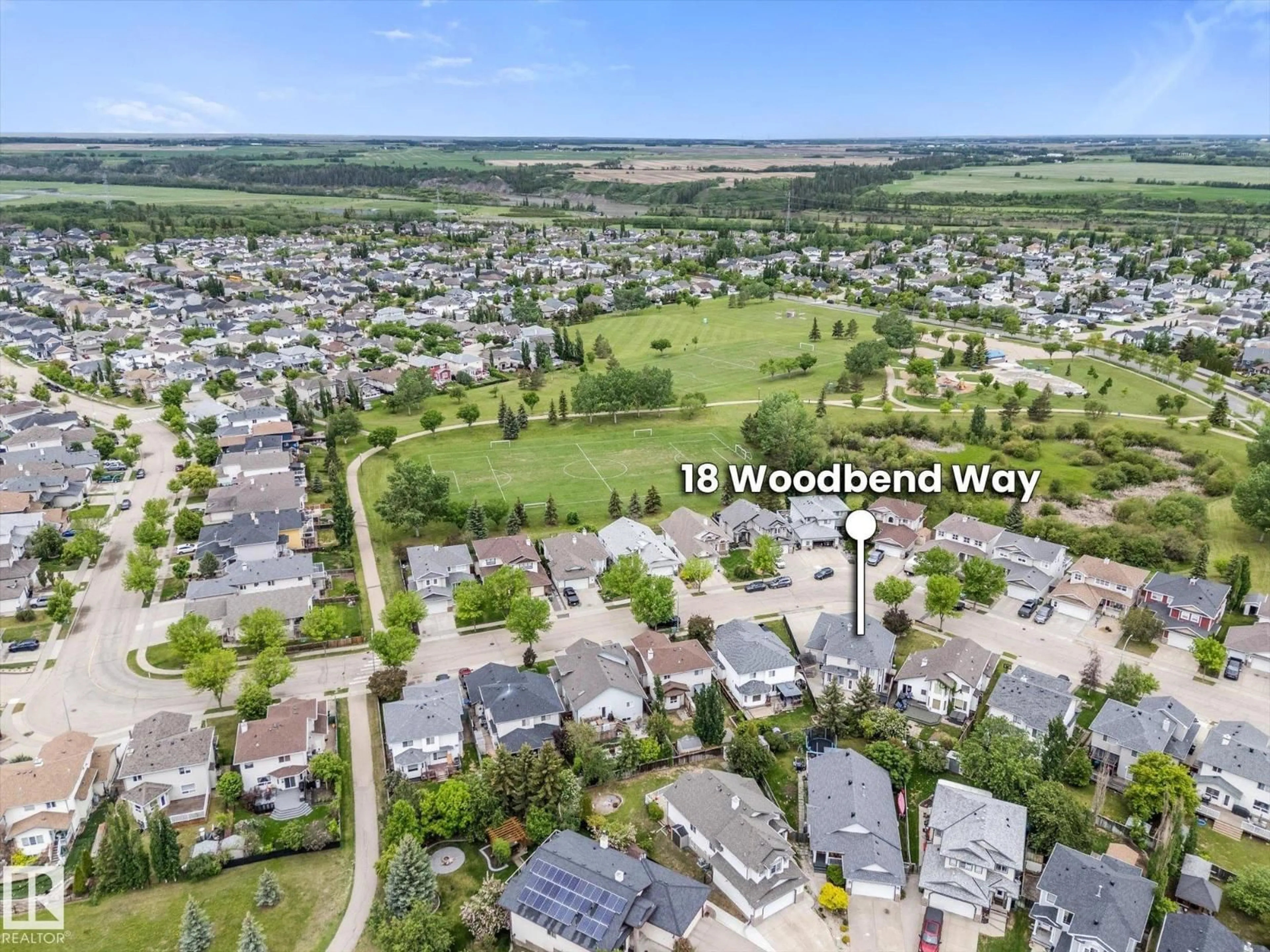 A pic from outside/outdoor area/front of a property/back of a property/a pic from drone, mountain view for 18 WOODBEND WY, Fort Saskatchewan Alberta T8L4L8