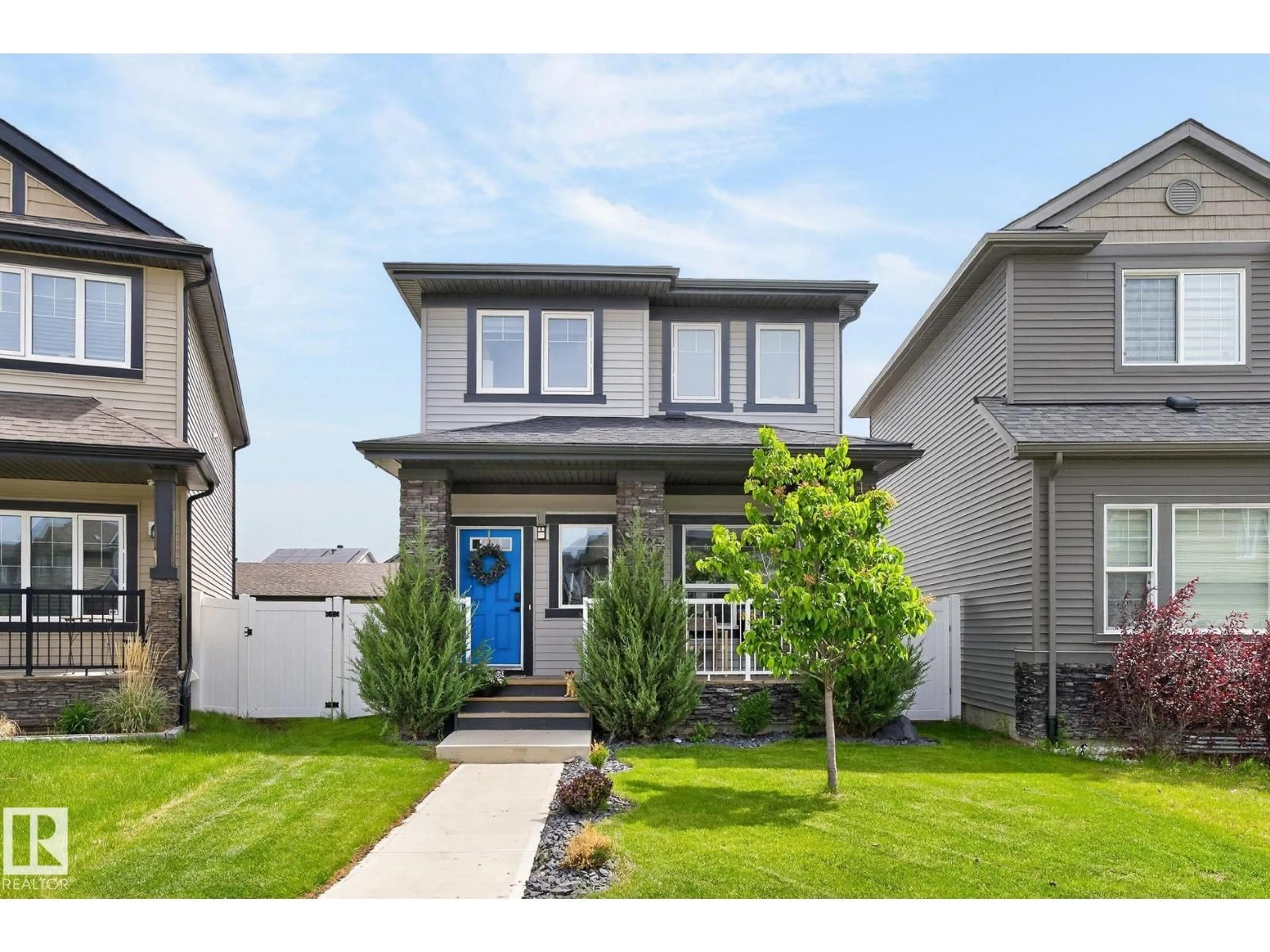 Home with vinyl exterior material, street for 17733 64A ST, Edmonton Alberta T5Y3X4