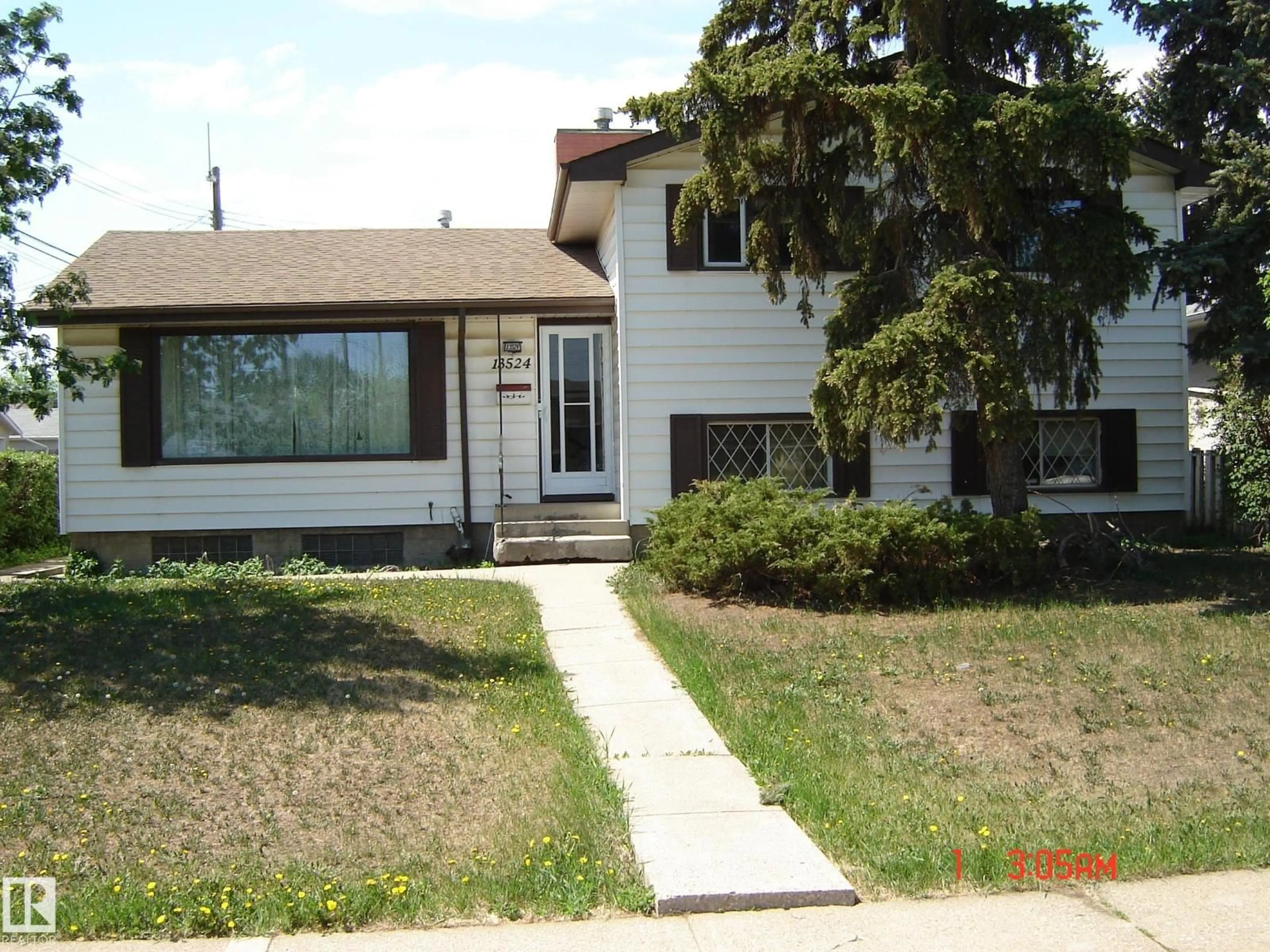 Home with vinyl exterior material, street for NW - 13524 92 ST, Edmonton Alberta T5E3R9