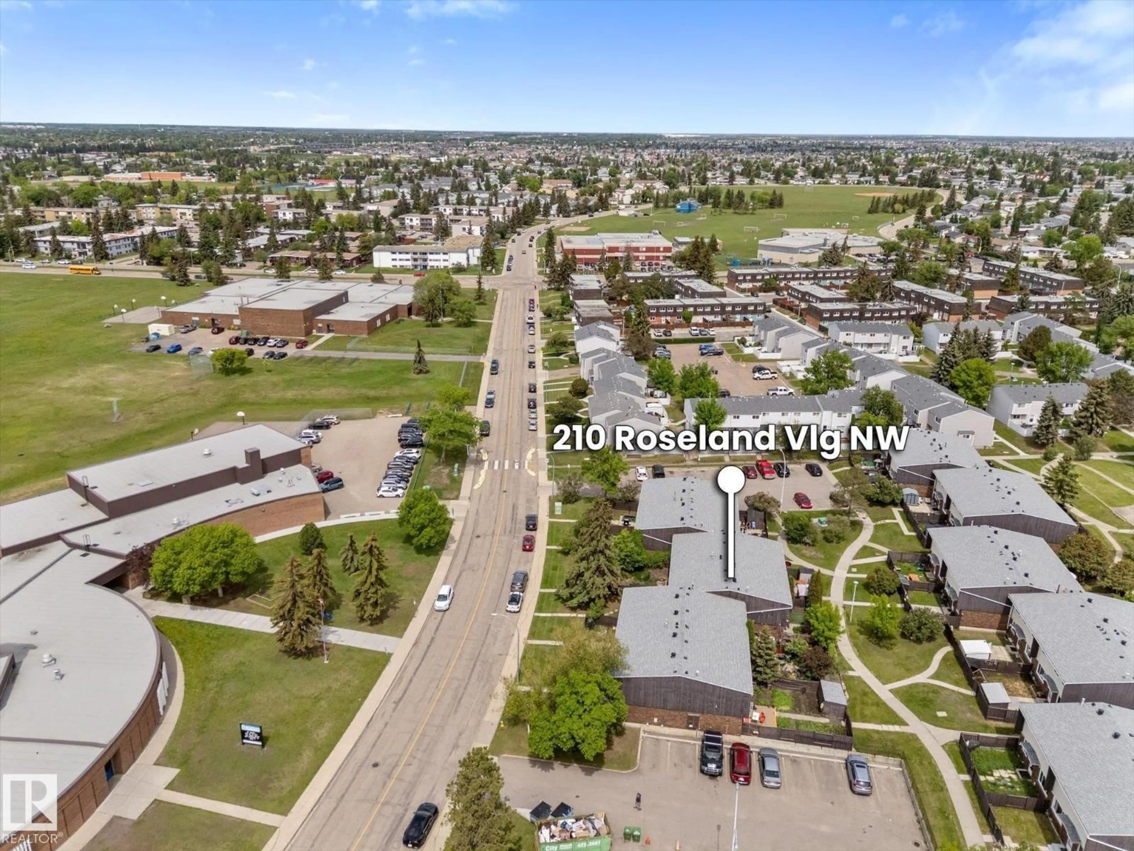 A pic from outside/outdoor area/front of a property/back of a property/a pic from drone, street for NW - 210 ROSELAND VG, Edmonton Alberta T5E5R6