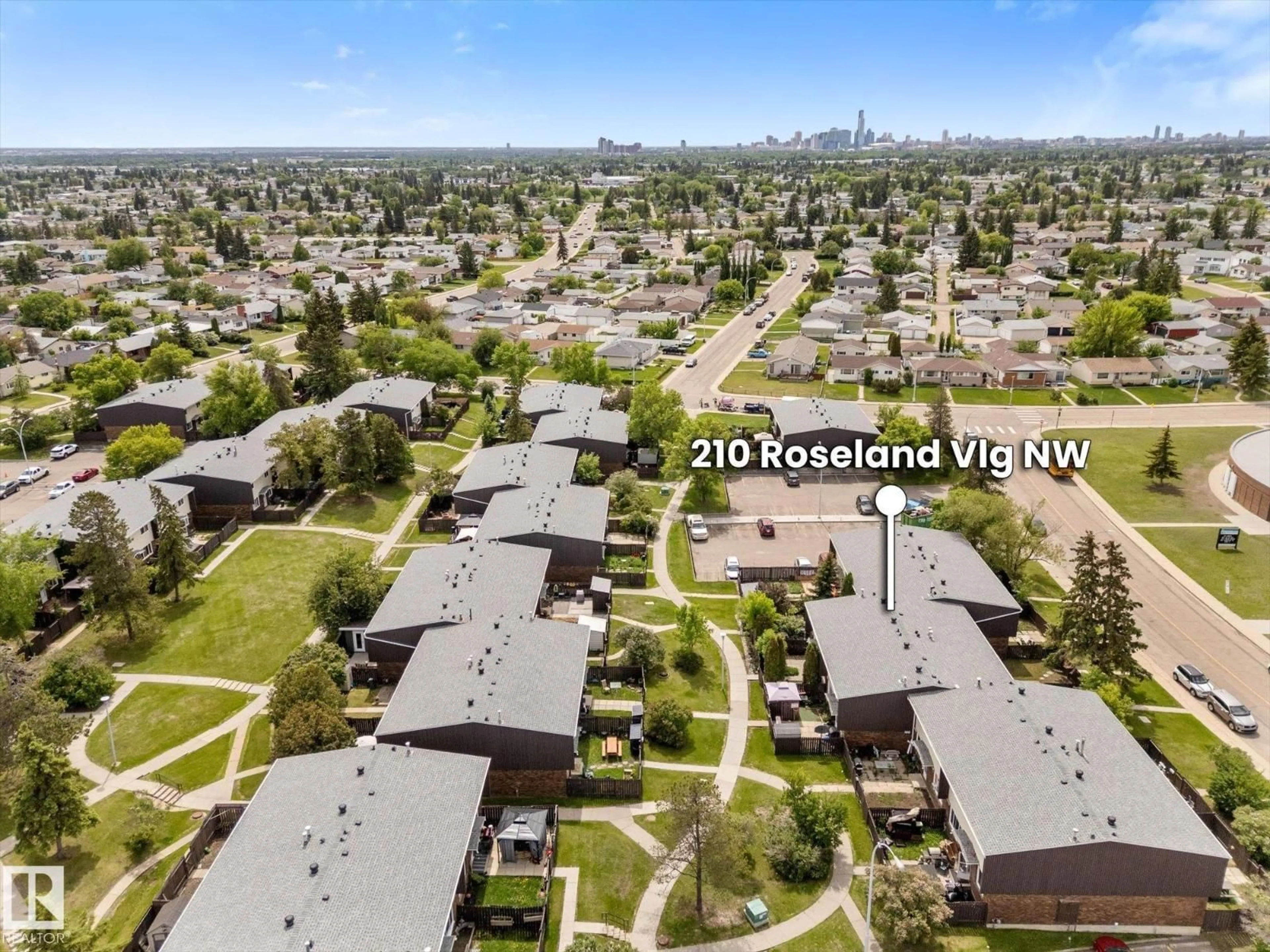 A pic from outside/outdoor area/front of a property/back of a property/a pic from drone, street for NW - 210 ROSELAND VG, Edmonton Alberta T5E5R6