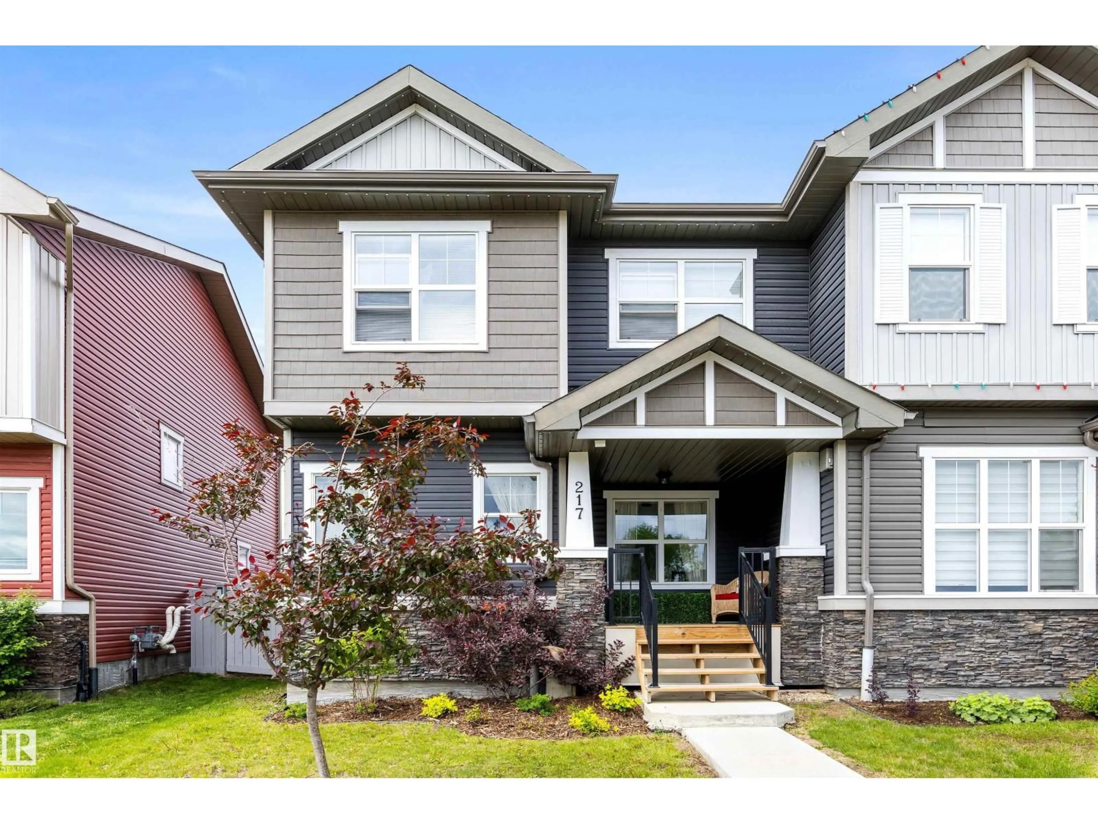 Home with vinyl exterior material, street for 217 GRIESBACH RD, Edmonton Alberta T5E6S5
