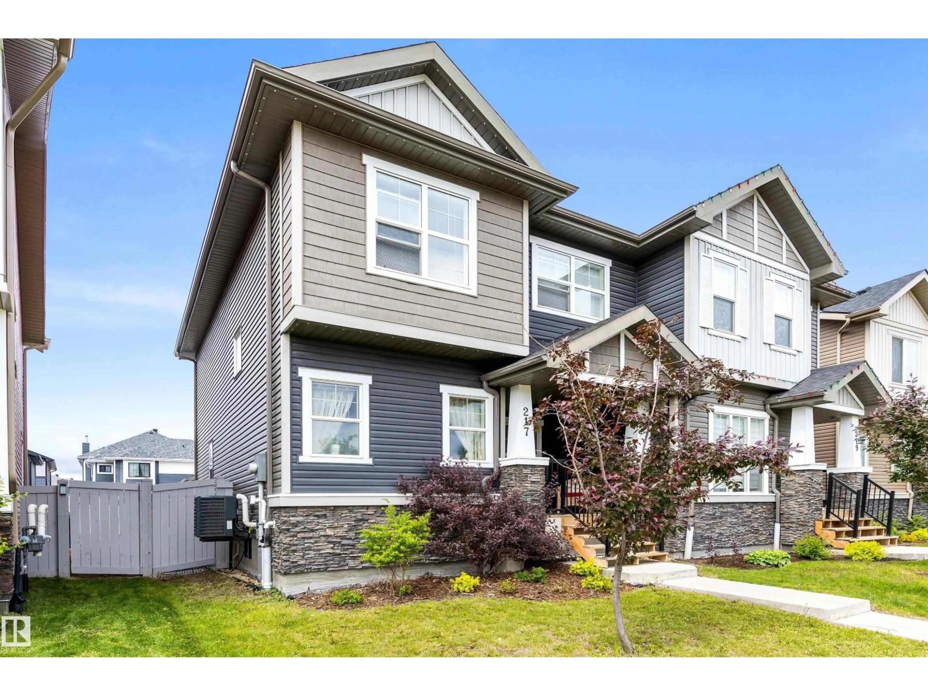Home with vinyl exterior material, street for 217 GRIESBACH RD, Edmonton Alberta T5E6S5