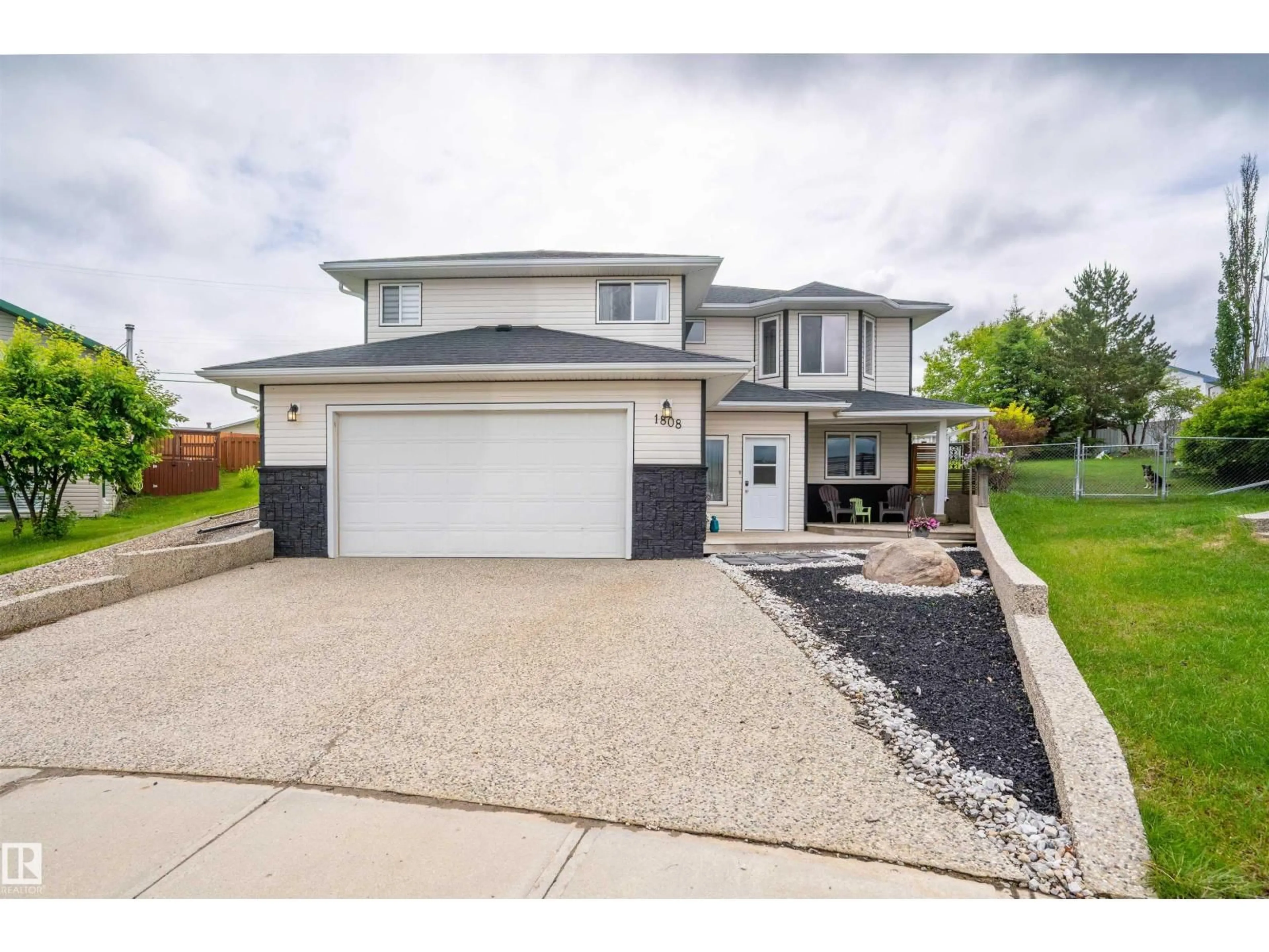Home with vinyl exterior material, street for 1808 7 ST, Cold Lake Alberta T9M1M7
