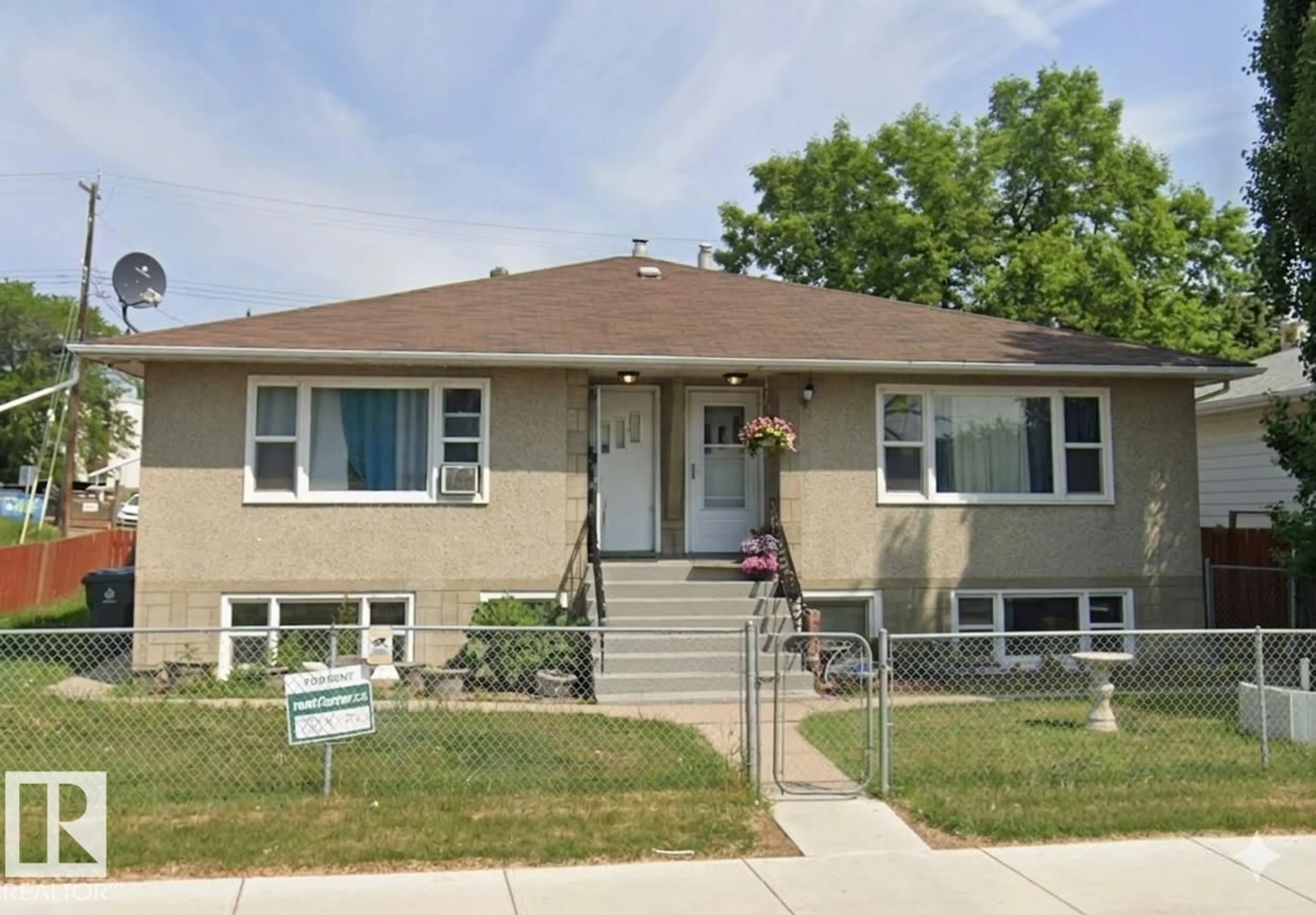 Home with vinyl exterior material, street for 6422 132 AV, Edmonton Alberta T6V1T4