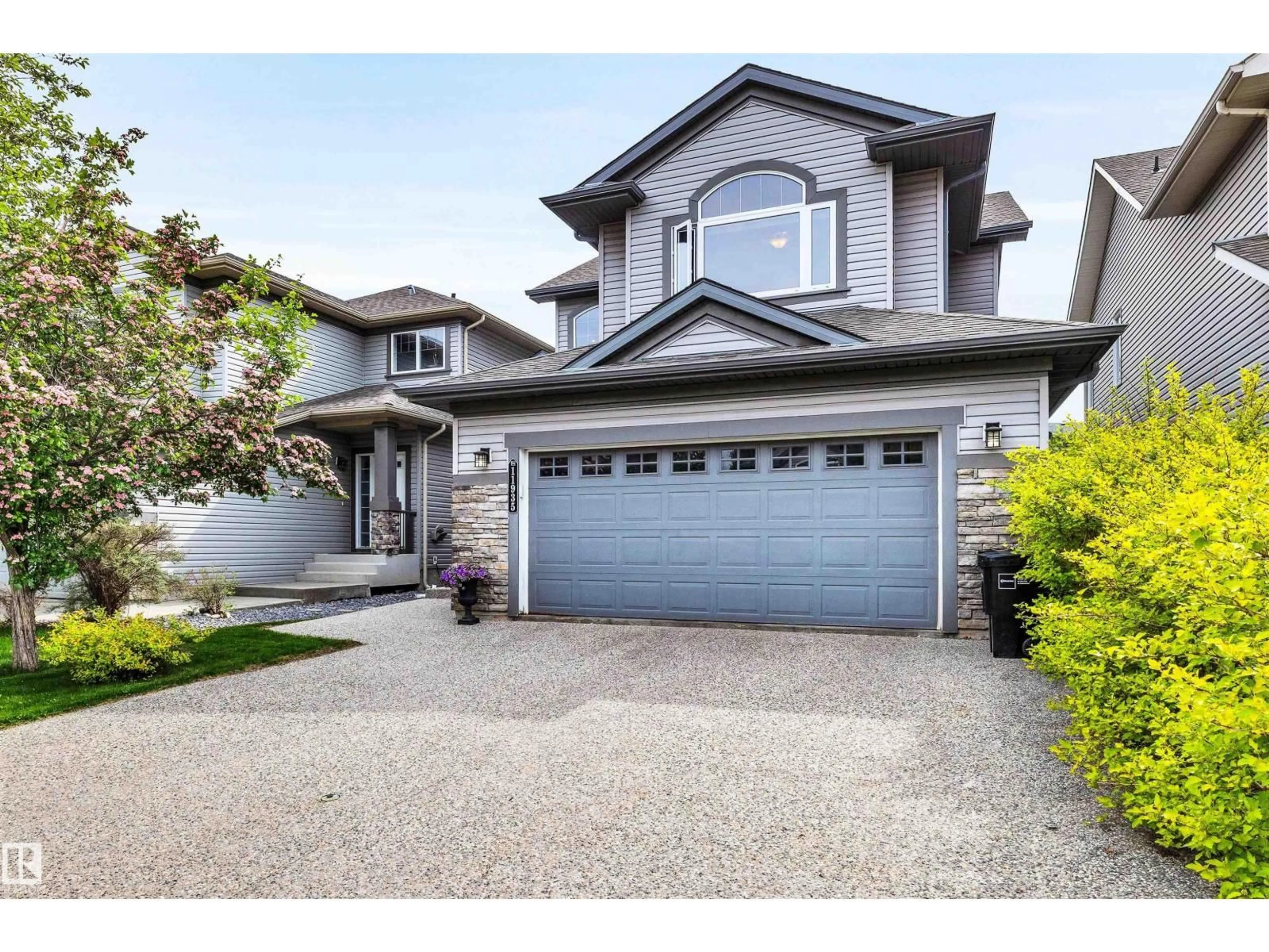 Home with vinyl exterior material, street for SW - 11935 21 AV, Edmonton Alberta T6W0C8