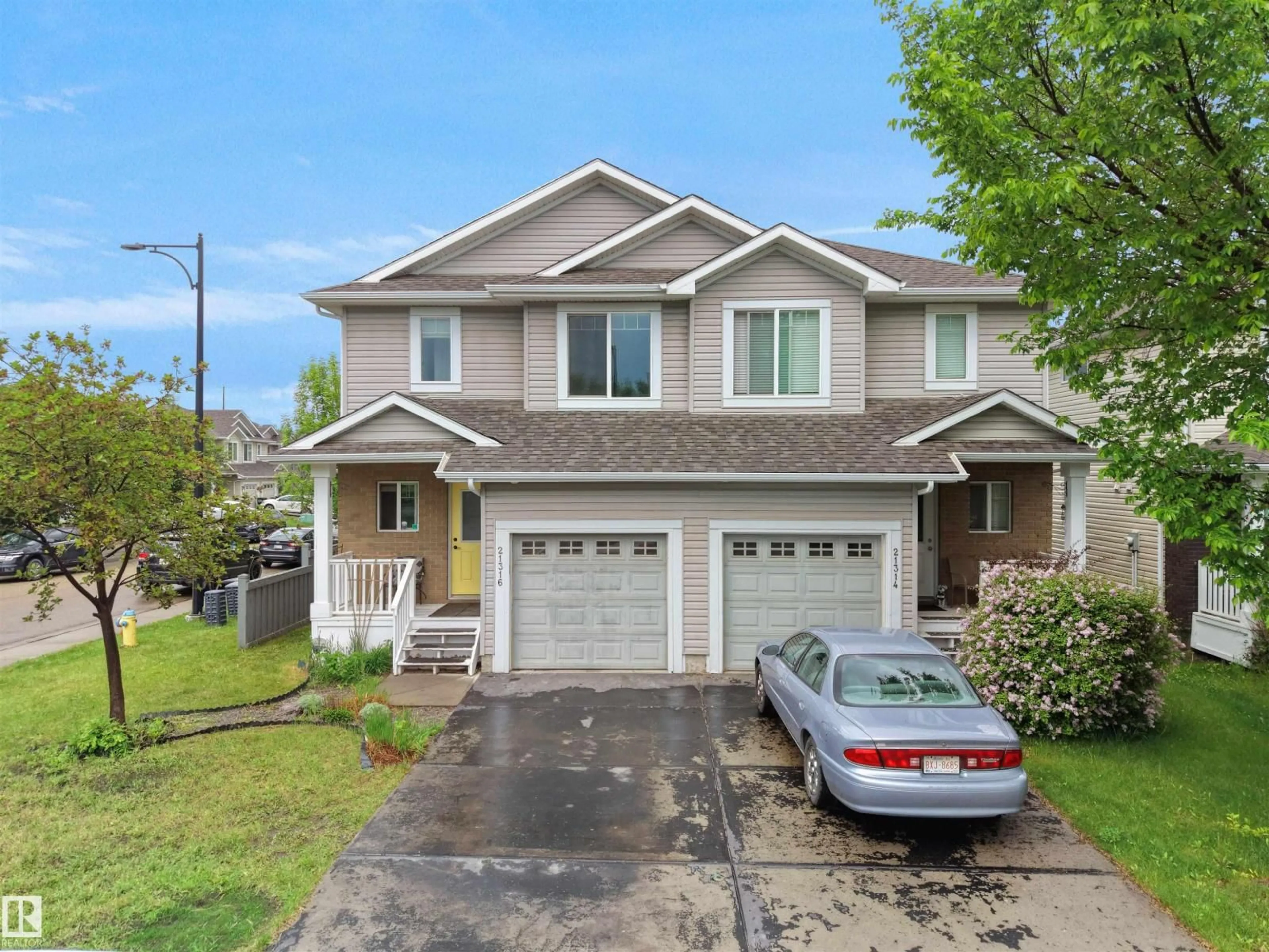 Home with vinyl exterior material, street for 21316 45A AVENUE AVENUE, Edmonton Alberta T6M0H1