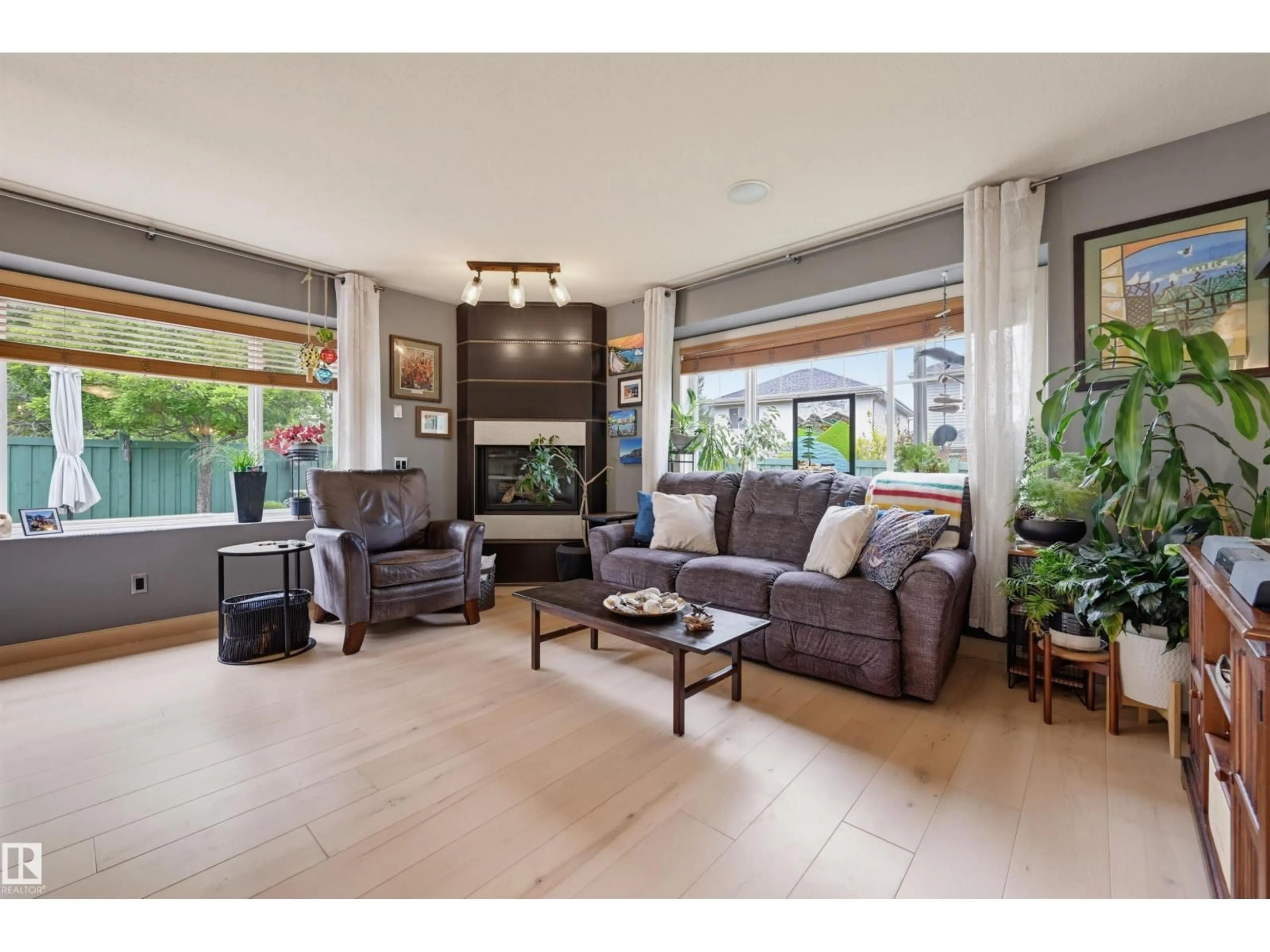 Living room with furniture, ceramic/tile floor for 60 2565 HANNA CR NW, Edmonton Alberta T6R0M4