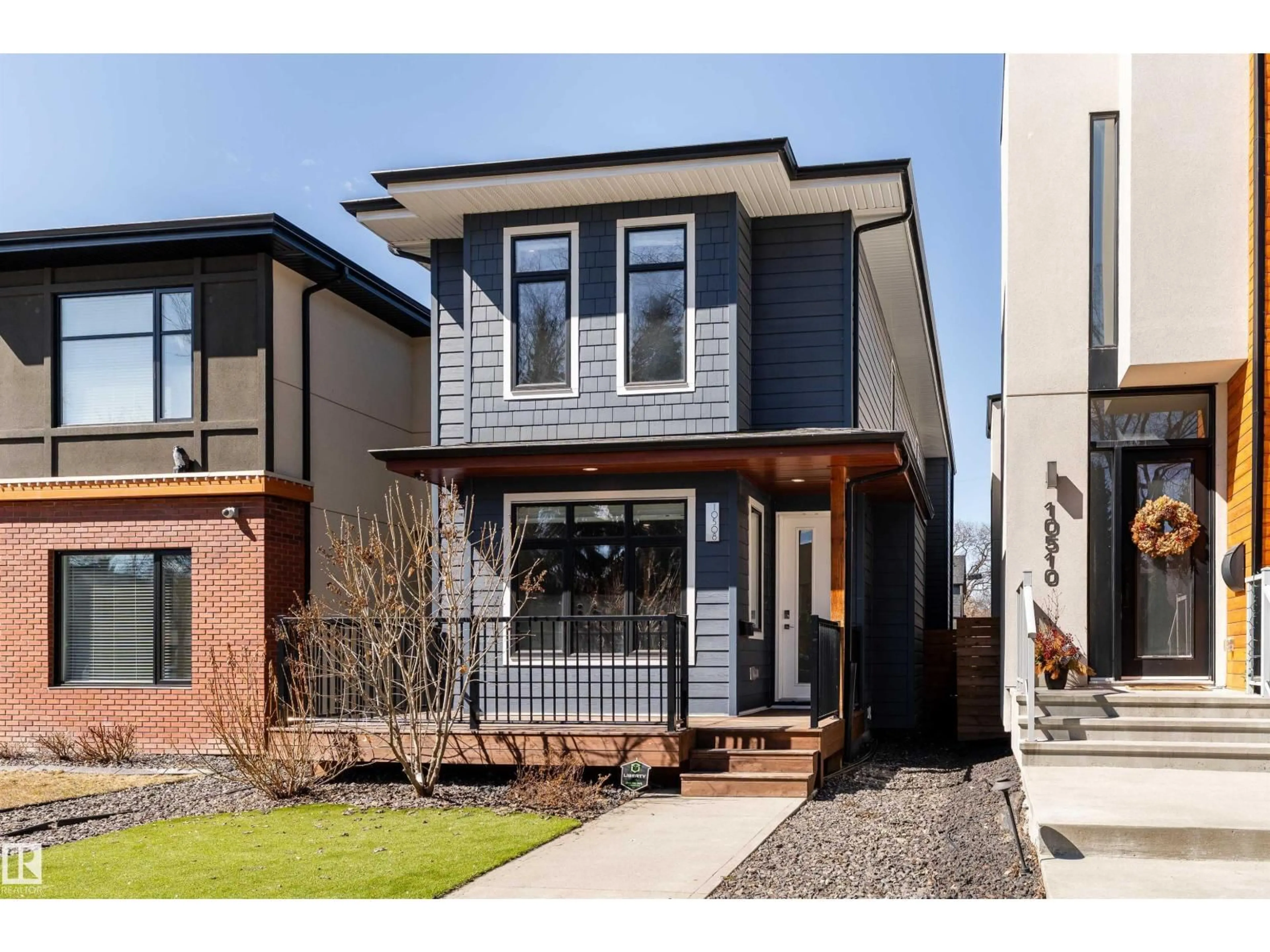 Home with brick exterior material, street for NW - 10508 136 ST, Edmonton Alberta T5N2E9