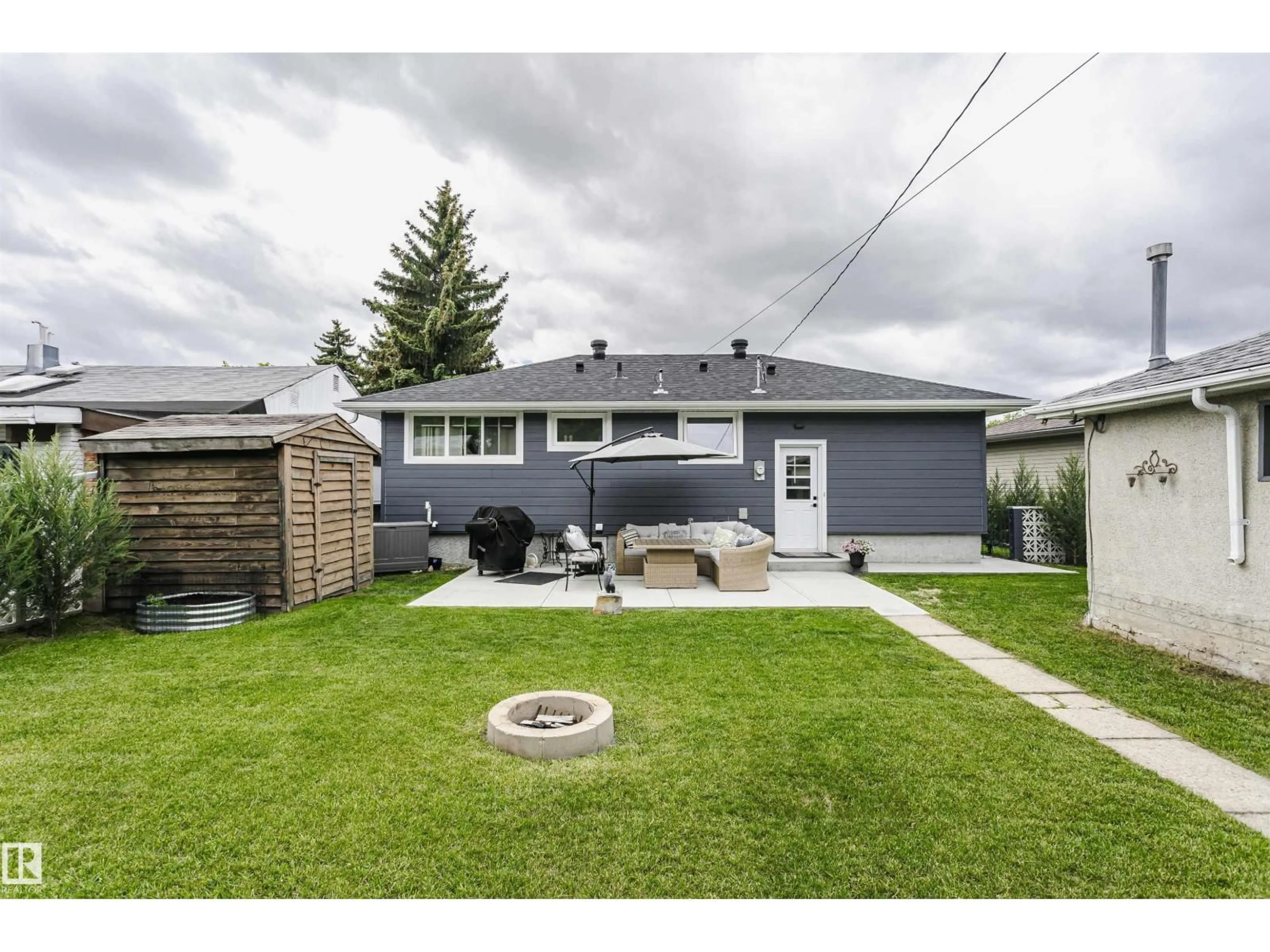 A pic from outside/outdoor area/front of a property/back of a property/a pic from drone, street for 8628 64 AV, Edmonton Alberta T6E0H5