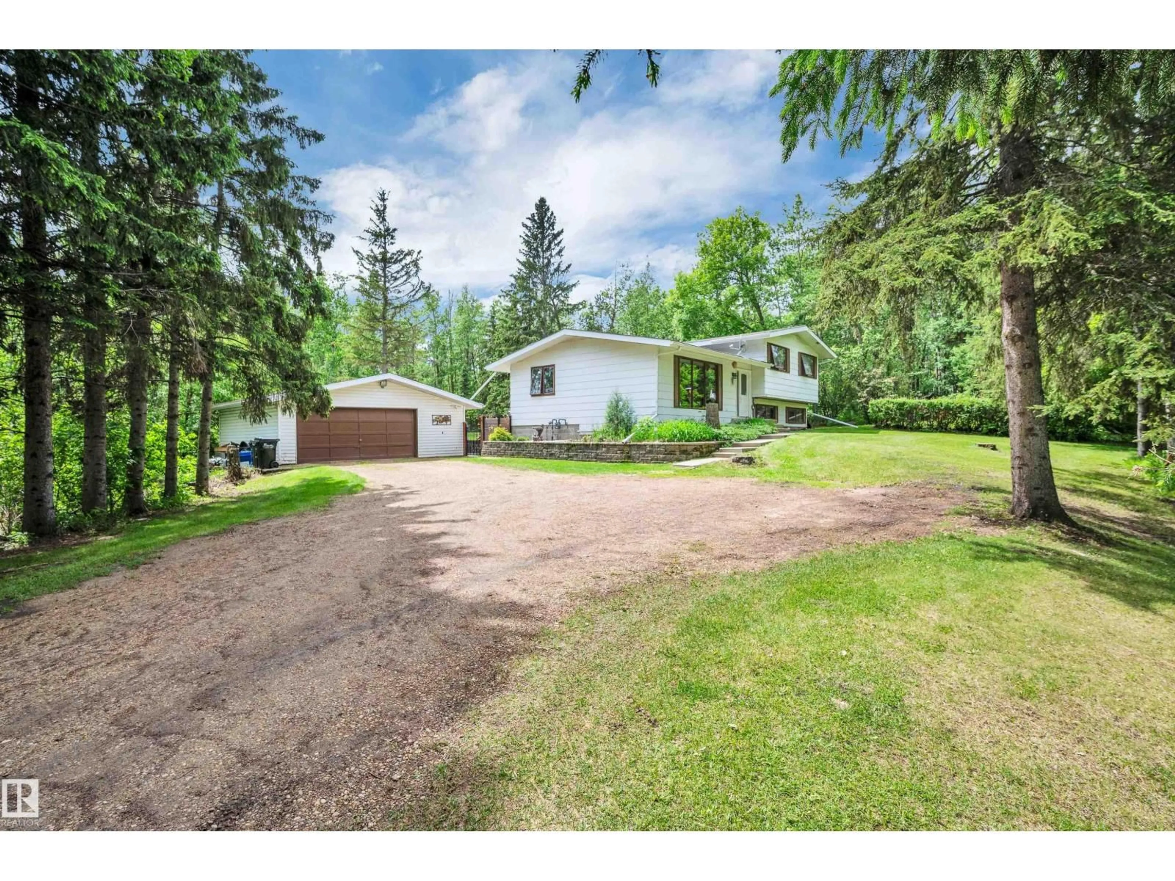 A pic from outside/outdoor area/front of a property/back of a property/a pic from drone, street for 230 52152 RGE ROAD 225, Rural Strathcona County Alberta T8C1C6