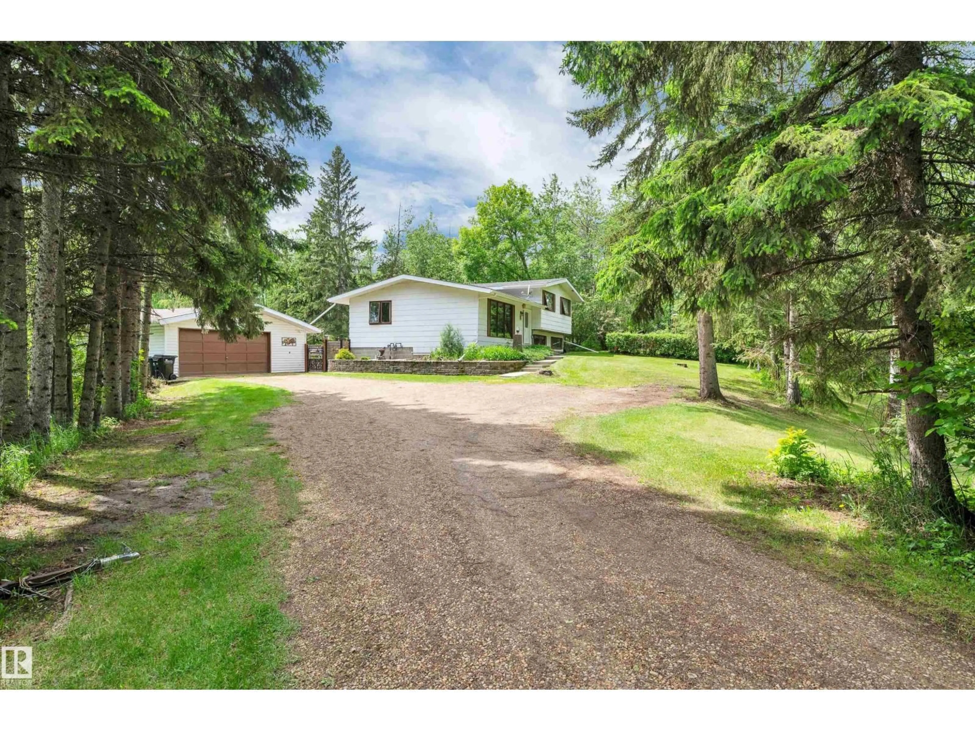 A pic from outside/outdoor area/front of a property/back of a property/a pic from drone, street for 230 52152 RGE ROAD 225, Rural Strathcona County Alberta T8C1C6