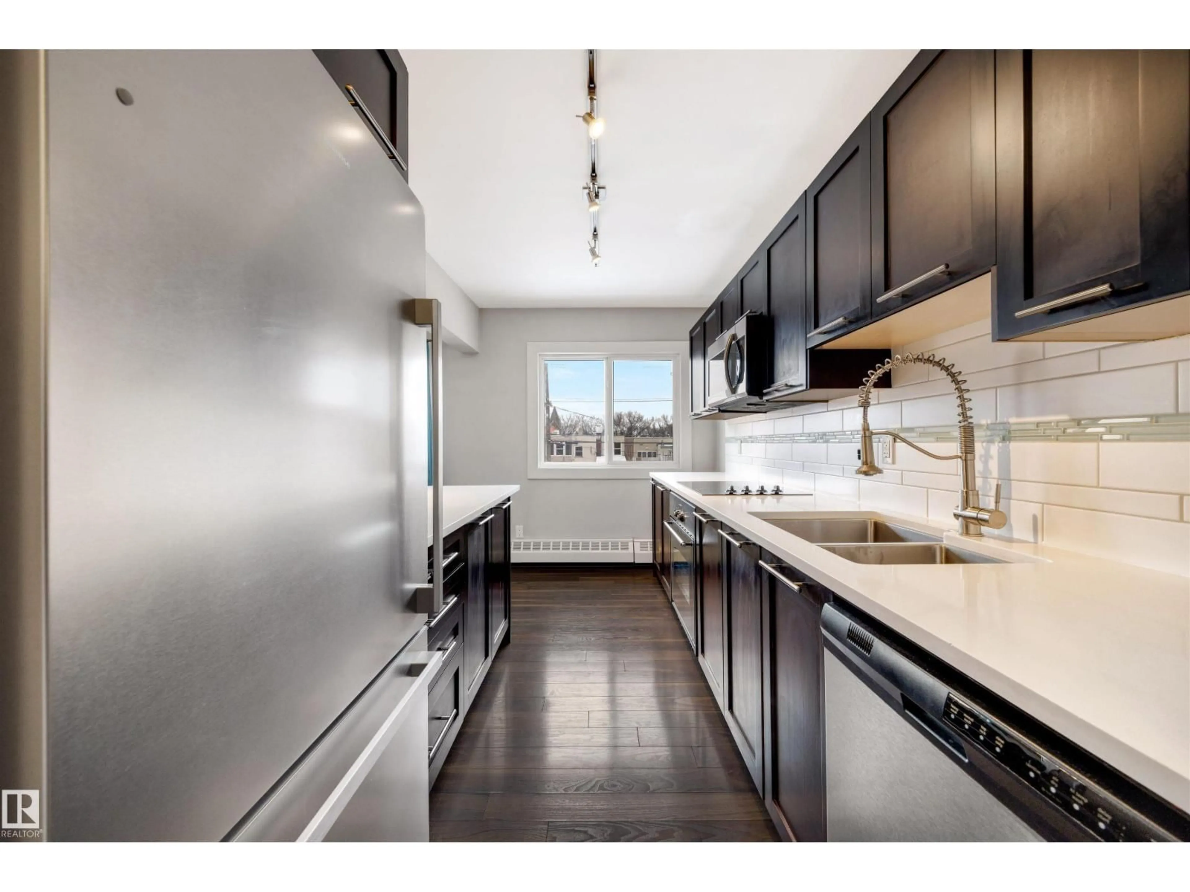 Open concept kitchen, unknown for NW - 32 10015 83 AV, Edmonton Alberta T6E2C3