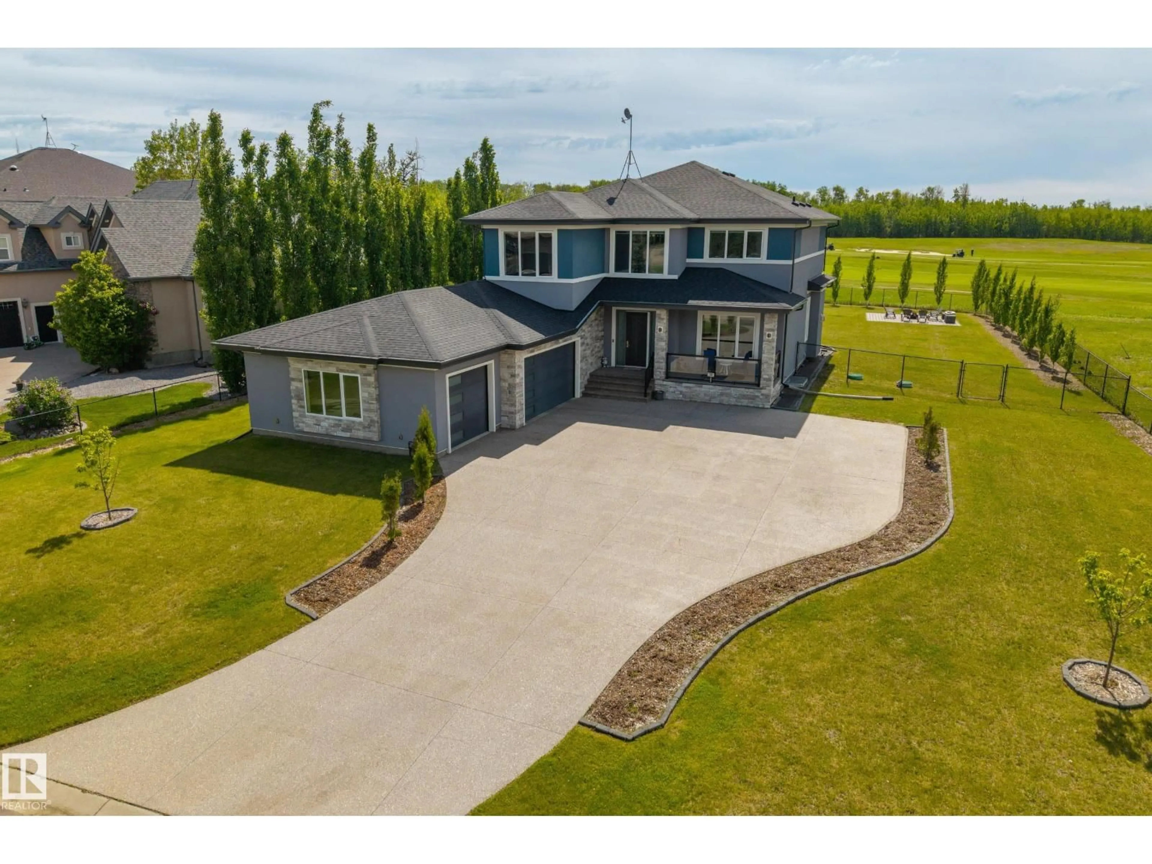 A pic from outside/outdoor area/front of a property/back of a property/a pic from drone, street for 51025 - 38 RGE ROAD 222 RGE ROAD, Rural Strathcona County Alberta T8C1J5