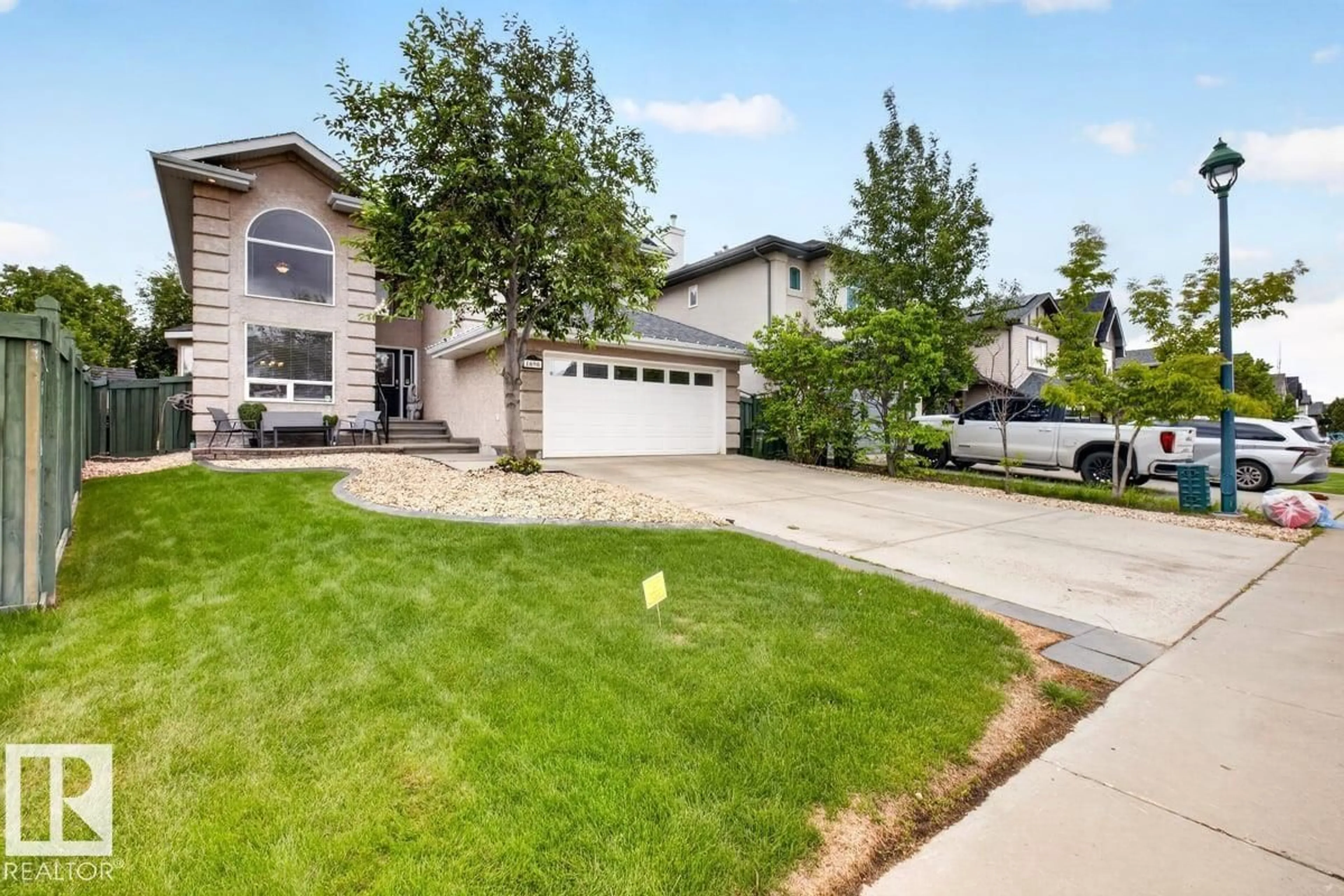 A pic from outside/outdoor area/front of a property/back of a property/a pic from drone, street for 1690 HECTOR RD, Edmonton Alberta T6R3B8