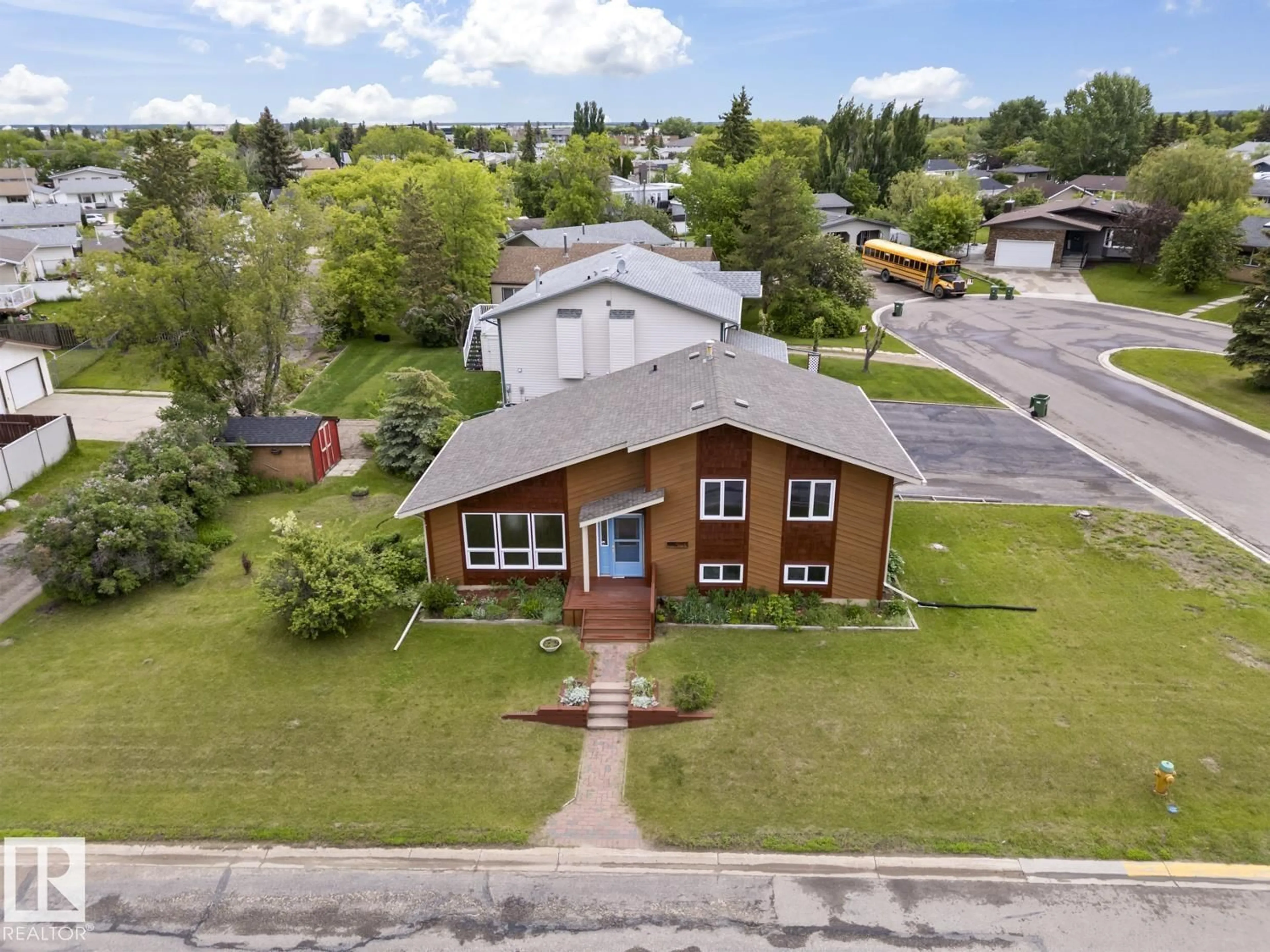 A pic from outside/outdoor area/front of a property/back of a property/a pic from drone, street for 4302 44 ST, Bonnyville Town Alberta T9N1W7