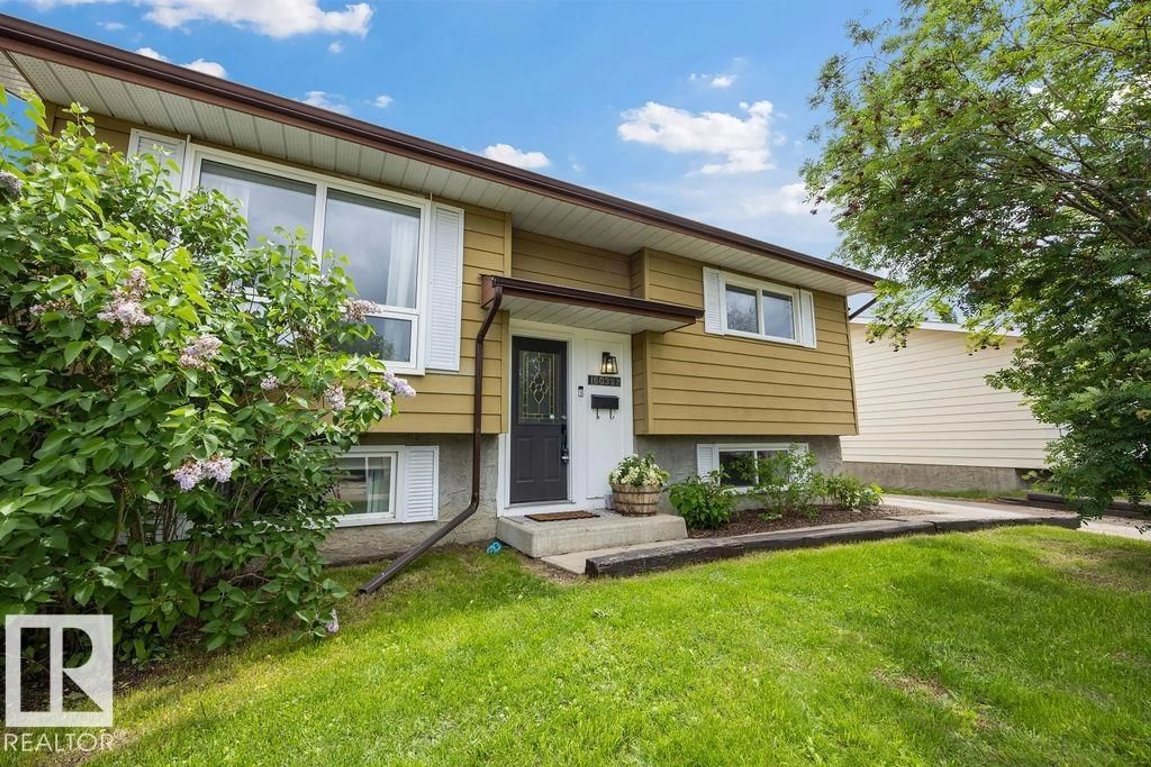 Home with vinyl exterior material, street for NW - 16035 123 ST, Edmonton Alberta T5X2W2